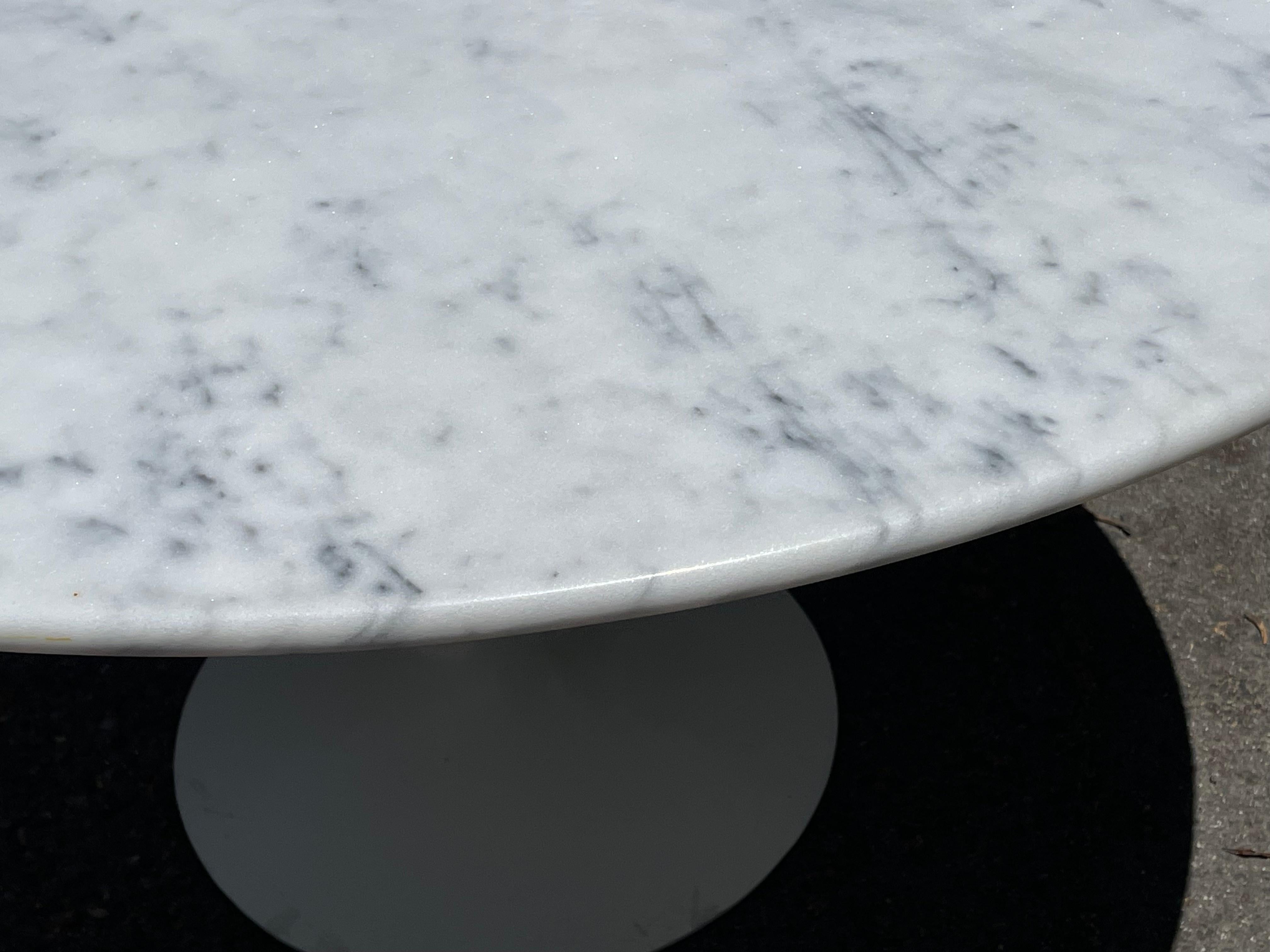 Remarkable original Eero Saarinen for Knoll Associates Tulip Dining Table with Marble Top, 1960s.

Exquisite vintage Tulip table by the iconic designer Eero Saarinen. This particular table is made by Knoll Associates in the USA in the 1960s. It