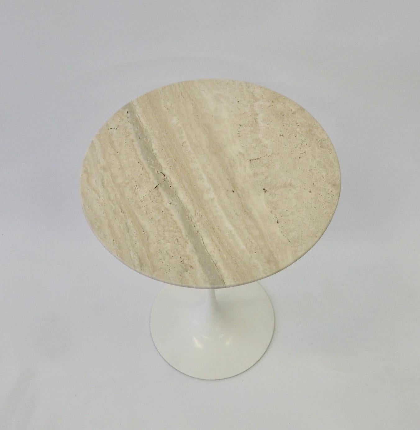 Eero Saarinen designed Tulip table with custom open grain Travertine marble stone top. Manufactured by Knoll.
