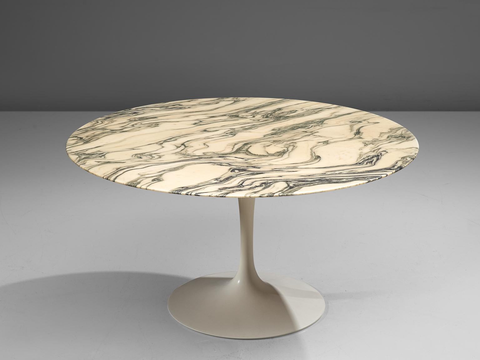 Eero Saarinen for Knoll International, dining table, metal and marble, United States, 1958.

This dining table from the Tulip collection and is designed by Eero Saarinen for Knoll International. This iconic tulip pedestal table is designed by Eero