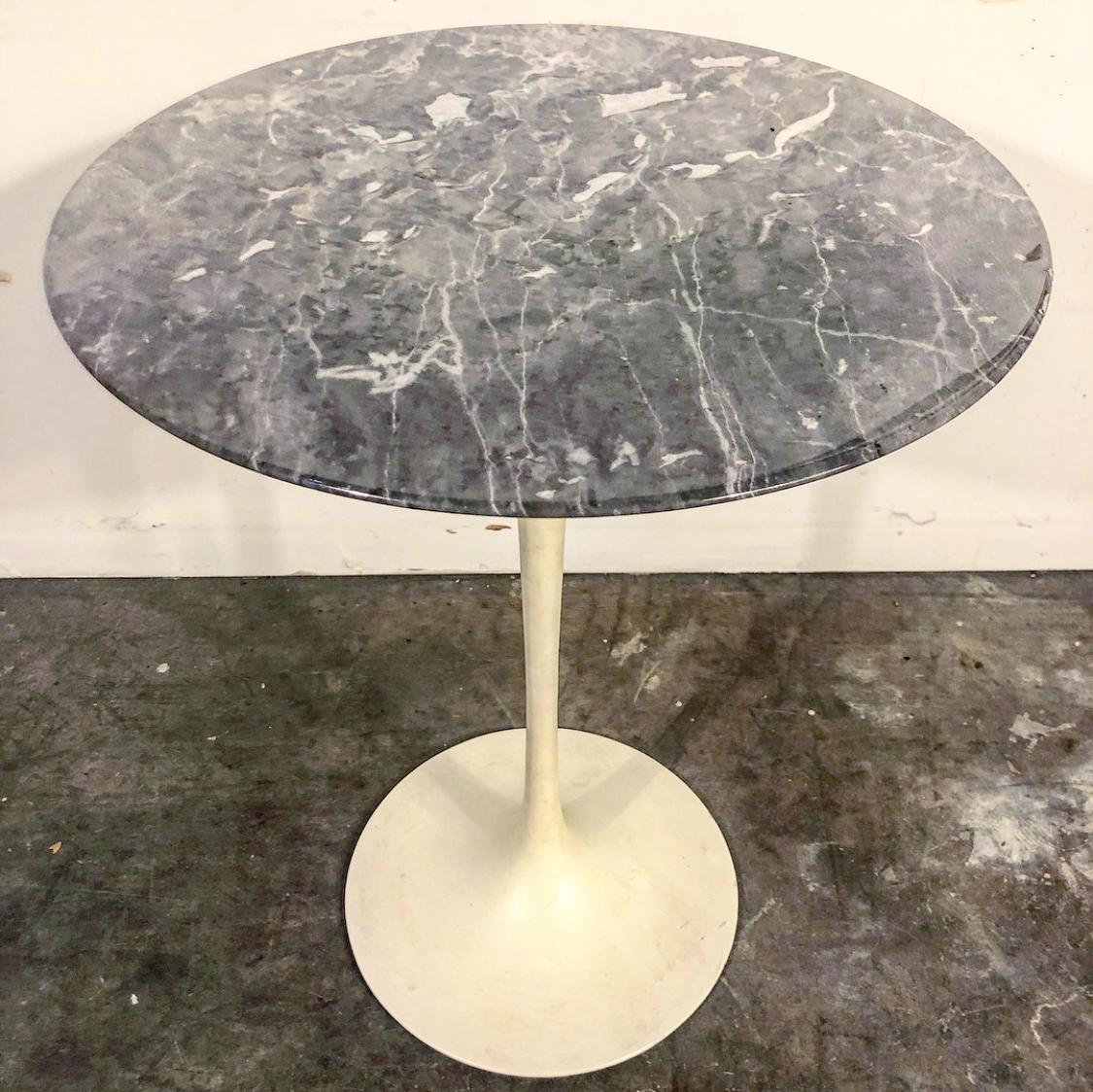Gorgeous Eero Saarinen for Knoll tulip side table. Flawless grey marble. 16 inches in diameter and 20 inches tall. In fantastic condition.