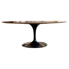 Eero Saarinen Medium Oval Rosewood Dining Table with Black Base