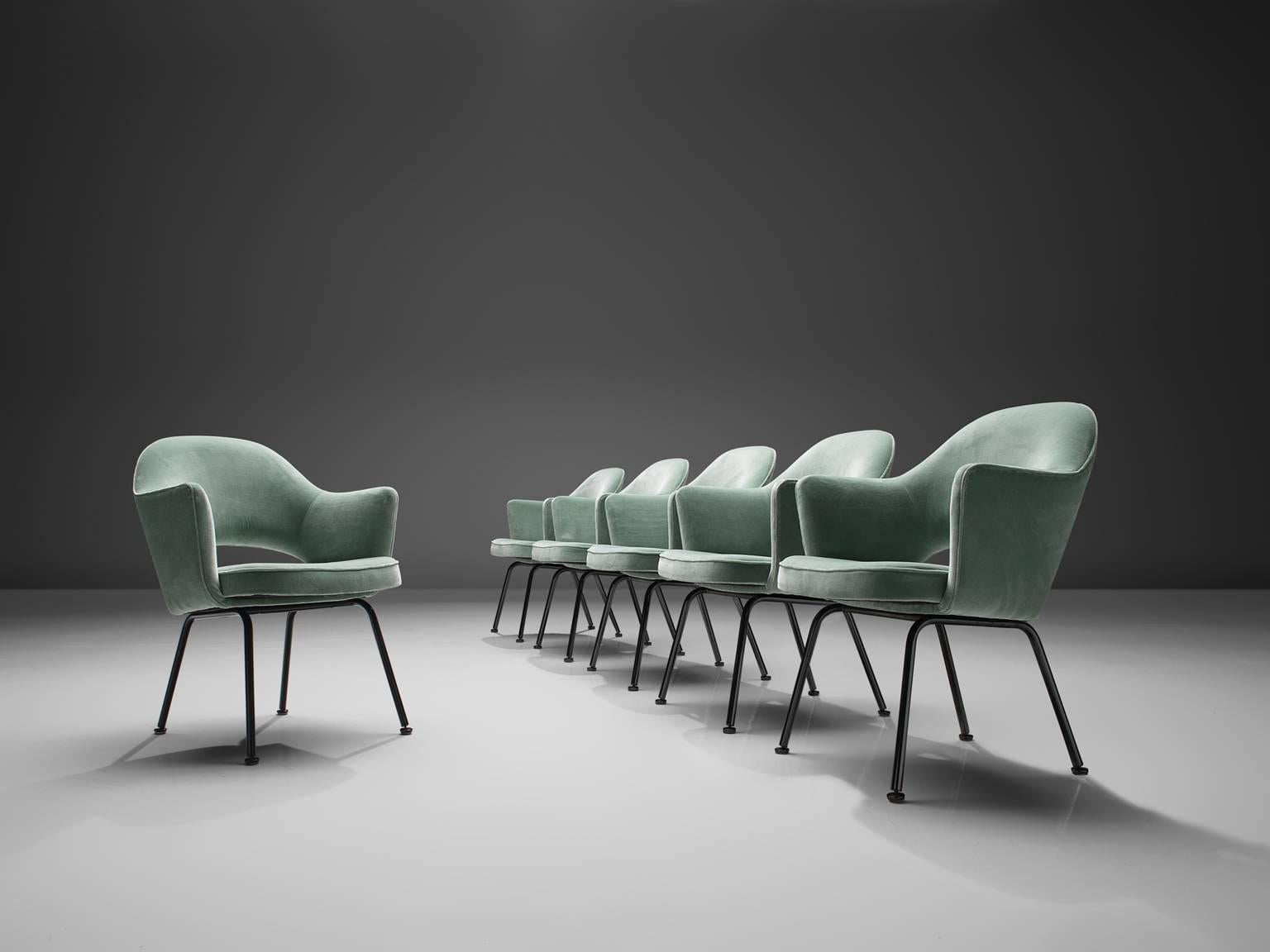 Eero Saarinen for Knoll International, set of 6 chairs, ocean green velvet and metal, United States, 1948. 

Eero Saarinen set of six armchairs. This iconic model is reupholstered in a lovely green velvet. The chairs feature a fluid, sculptural