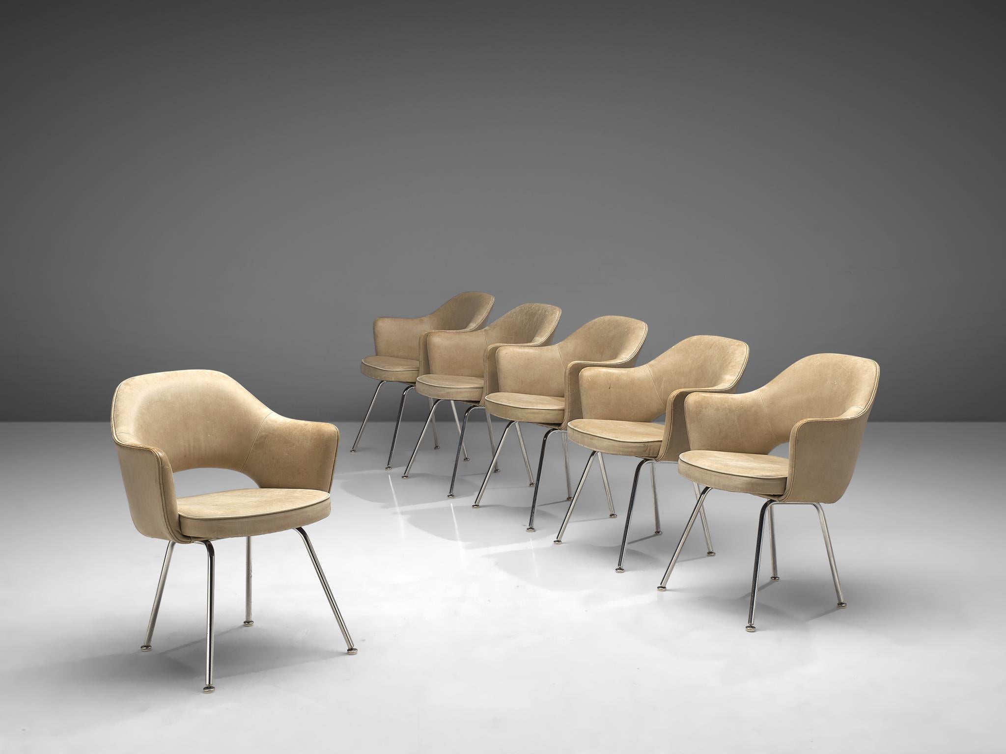 Eero Saarinen for Knoll International set of six chairs model 71A, in metal and light beige leather, United States, 1948.

Six iconic armchairs designed by Eero Saarinen. This iconic model is upholstered in light beige leather. The leather shows a