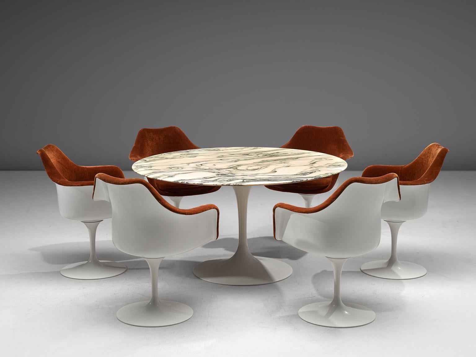 Eero Saarinen for Knoll International, dining set, metal, fiberglass, velvet and marble, United States, 1950s.

This dining table with six armchairs from the Tulip collection are designed by Eero Saarinen for Knoll International. This series is