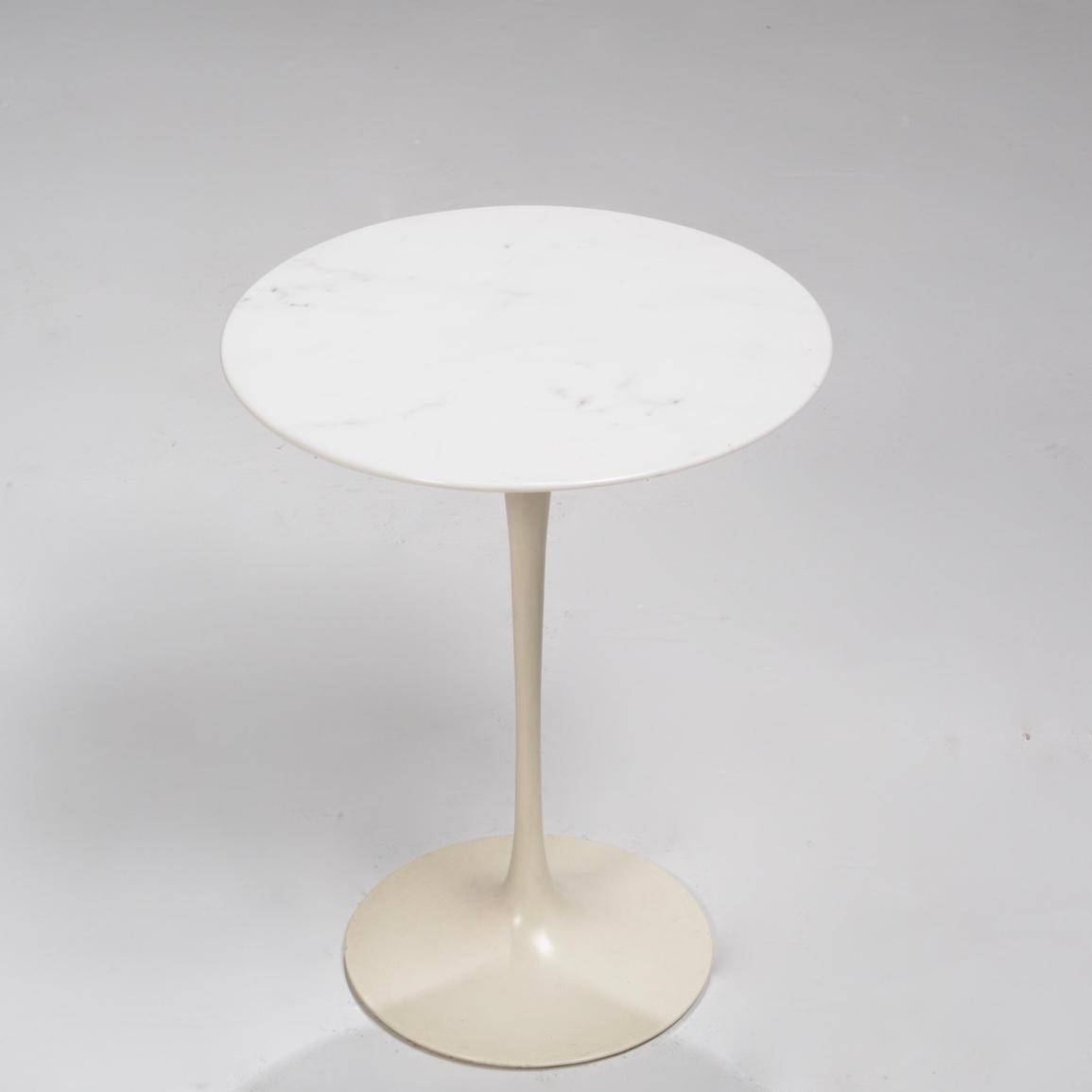 Eero Saarinen Tulip side table for Knoll International.
Beautiful marble top, white enameled metal base. 
Good original condition, marked with Knoll label. 
 