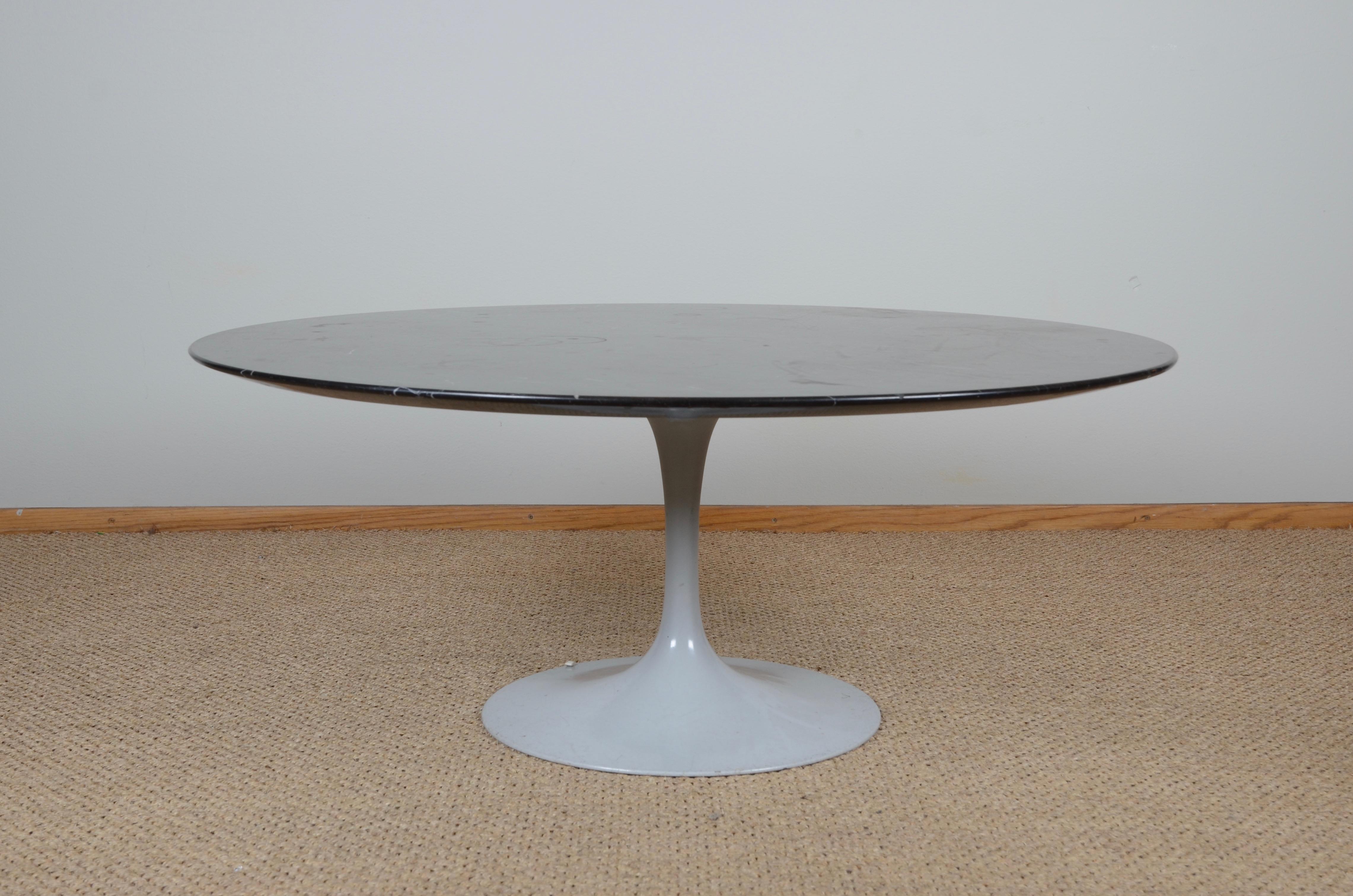 Coffee table model Tulip, designed by Eero Saarinen for Knoll International. 

Black marble top. Marked underneath table base.