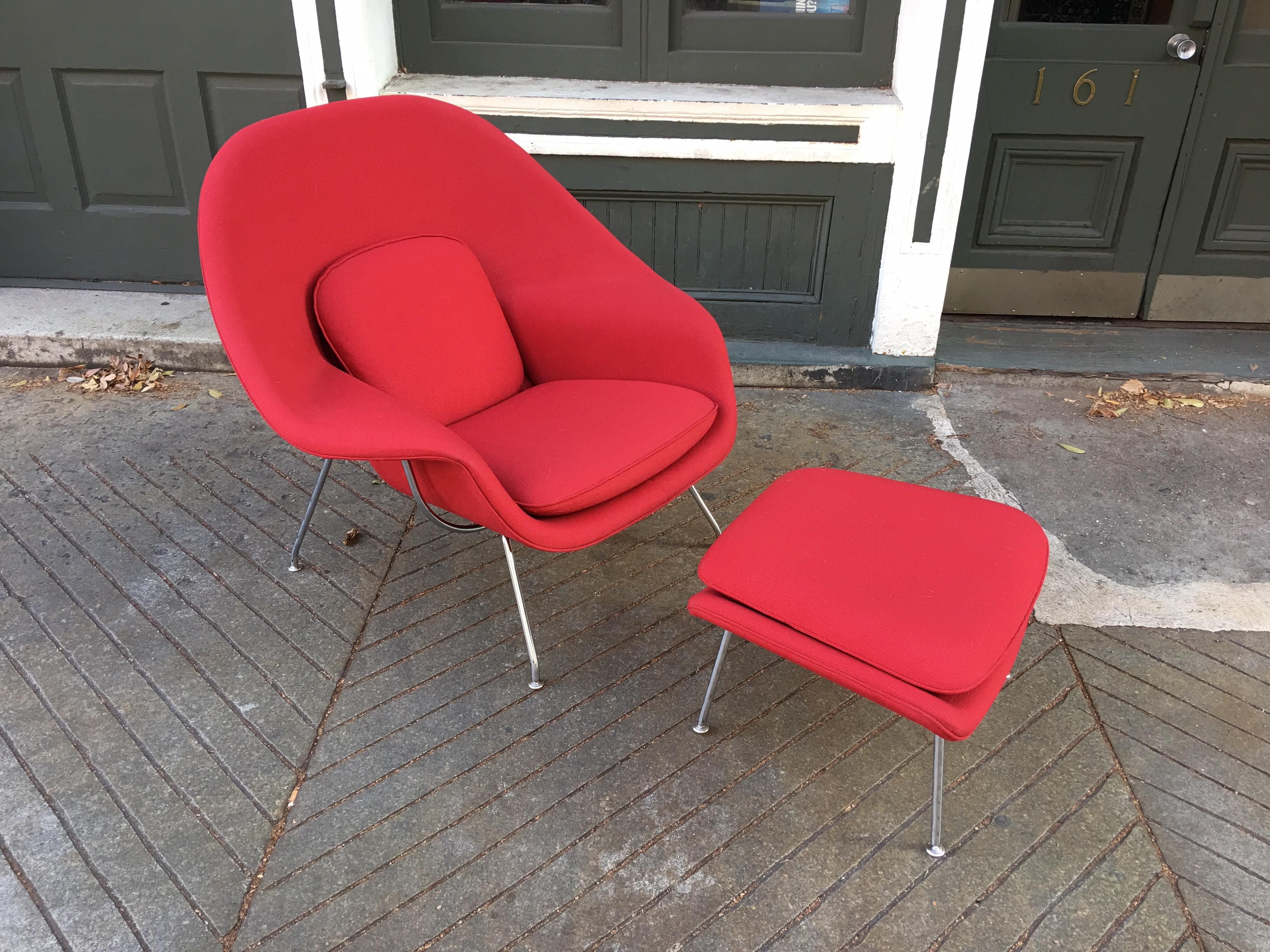 Nice clean example of a Knoll Classic! Chair is about 5-6 years old, retains its Knoll label as shown. Bright red fabric with no signs of wear. Chrome base, all glides present and working! Chair and Ottoman!