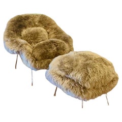Silla y otomana Eero Saarinen Womb de piel de oveja topo de Nueva Zelanda