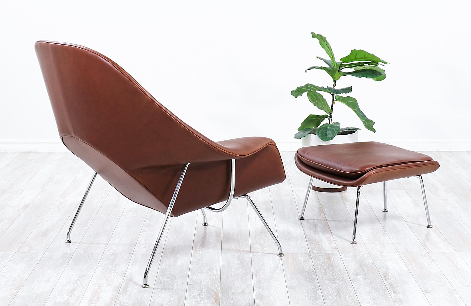 leather womb chair and ottoman