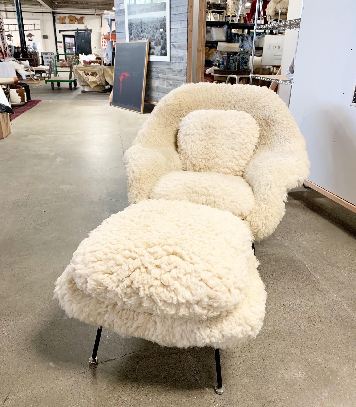 Our master upholsters restored this Saarinen ottoman in our cool California sheepskins to match our womb chair in California sheepskin.
