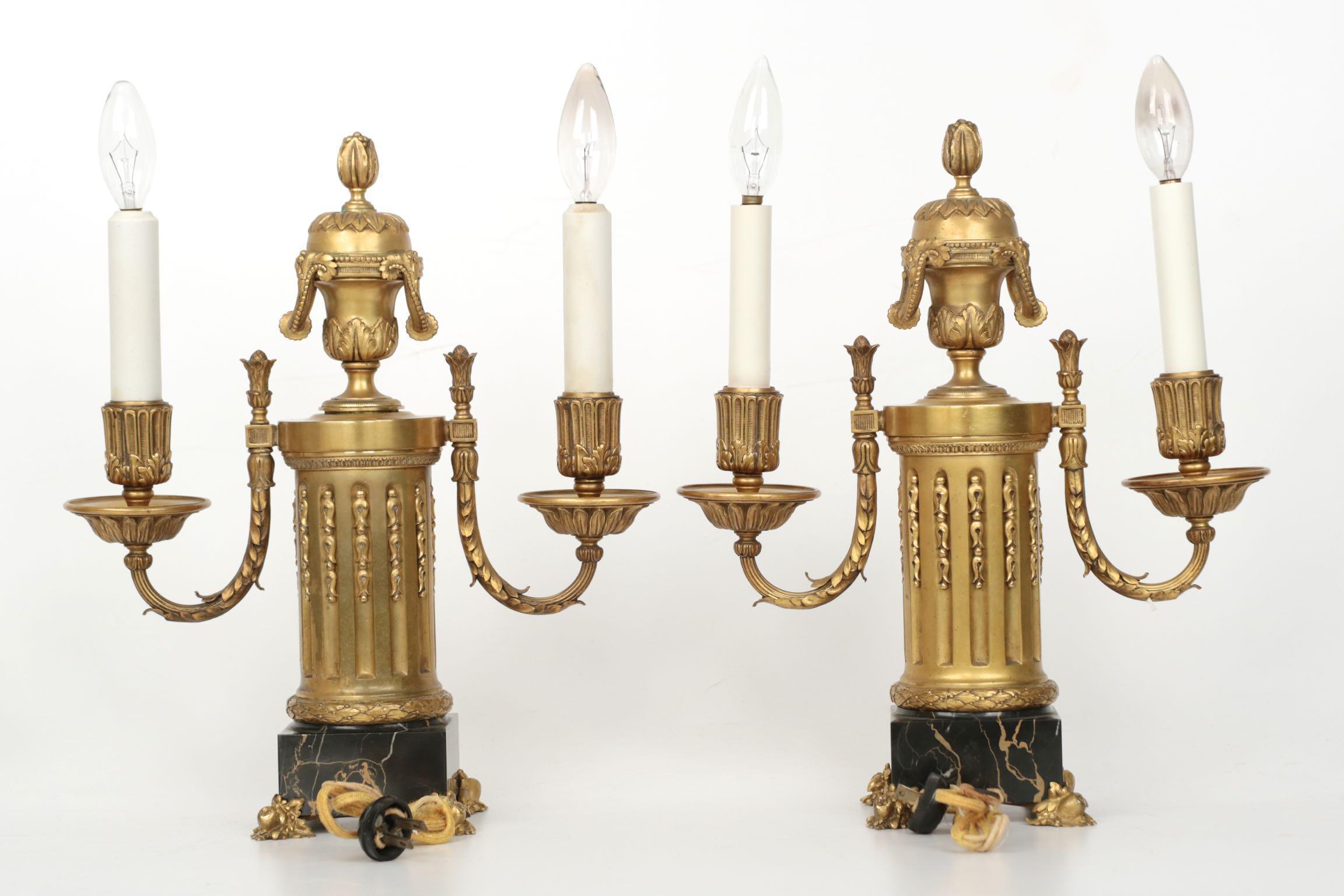 FINE PAIR OF GILT BRONZE AND MARBLE LAMPS BY E.F. CALDWELL
New York, circa 1900; foot stamped apparently A3933, unsigned
Item # 712KZW08P 

An exceptional and pristine pair of gilt bronze two-light lamps executed by the firm of Edward F. Caldwell