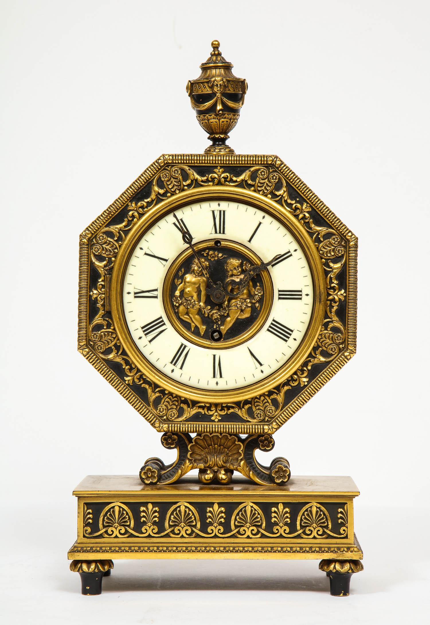 E.F. Caldwell & Co., an American gilt and patinated bronze ormolu clock,
late 19th/early 20th century.

Very high quality clock.

Enamel face and central reserve of two cherubs, New York, 
Inscribed 
