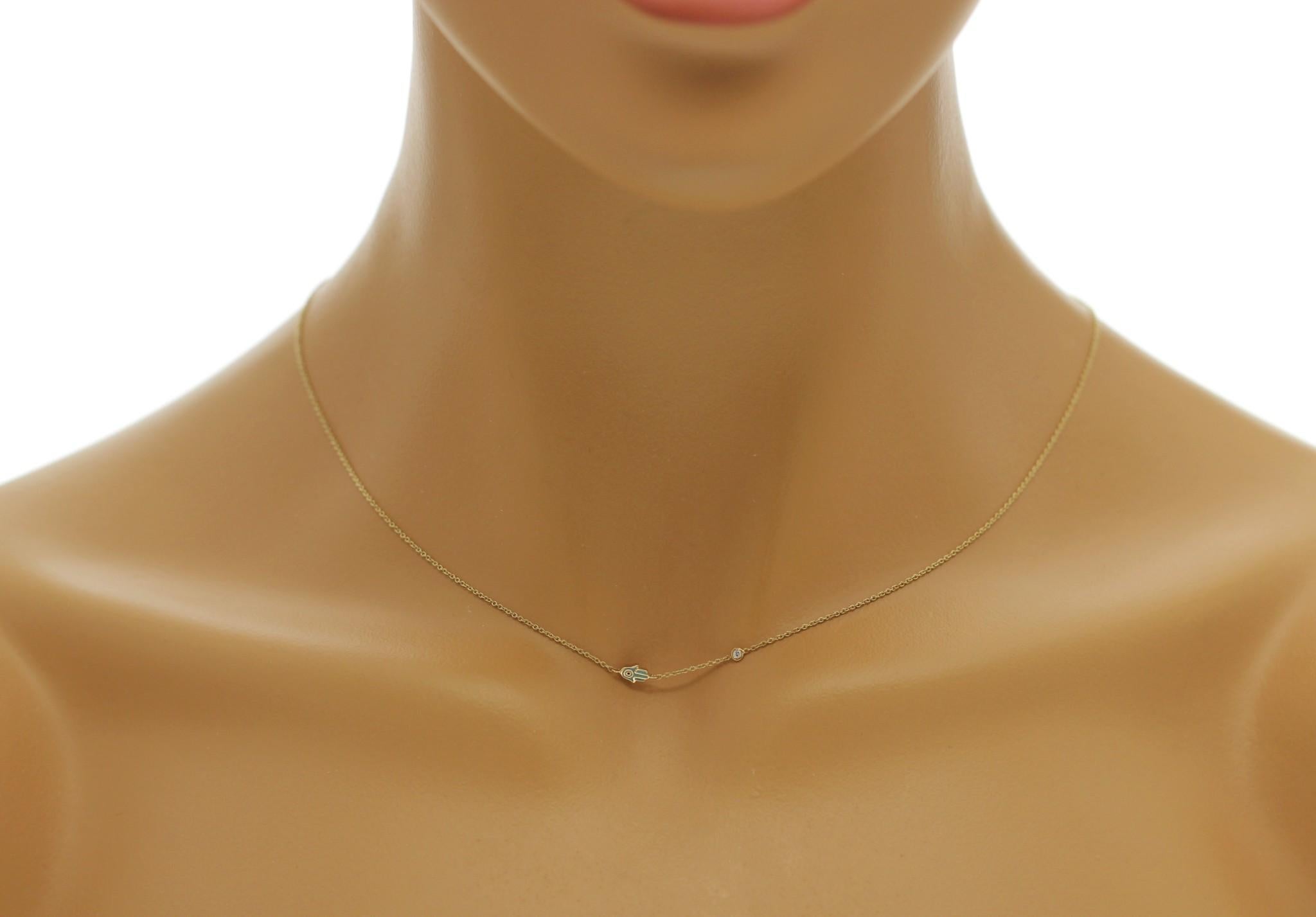 100% Authentic, 100% Customer Satisfaction

Pendant: 3.6 mm

Chain: 0.5 mm

Size: 16-18 Inches

Metal: 14K Yellow Gold

Hallmarks: 14K

Total Weight: 1.6 Grams

Stone Type: Diamonds

Condition: Like New

Estimated Price: $430

Stock Number: N218
