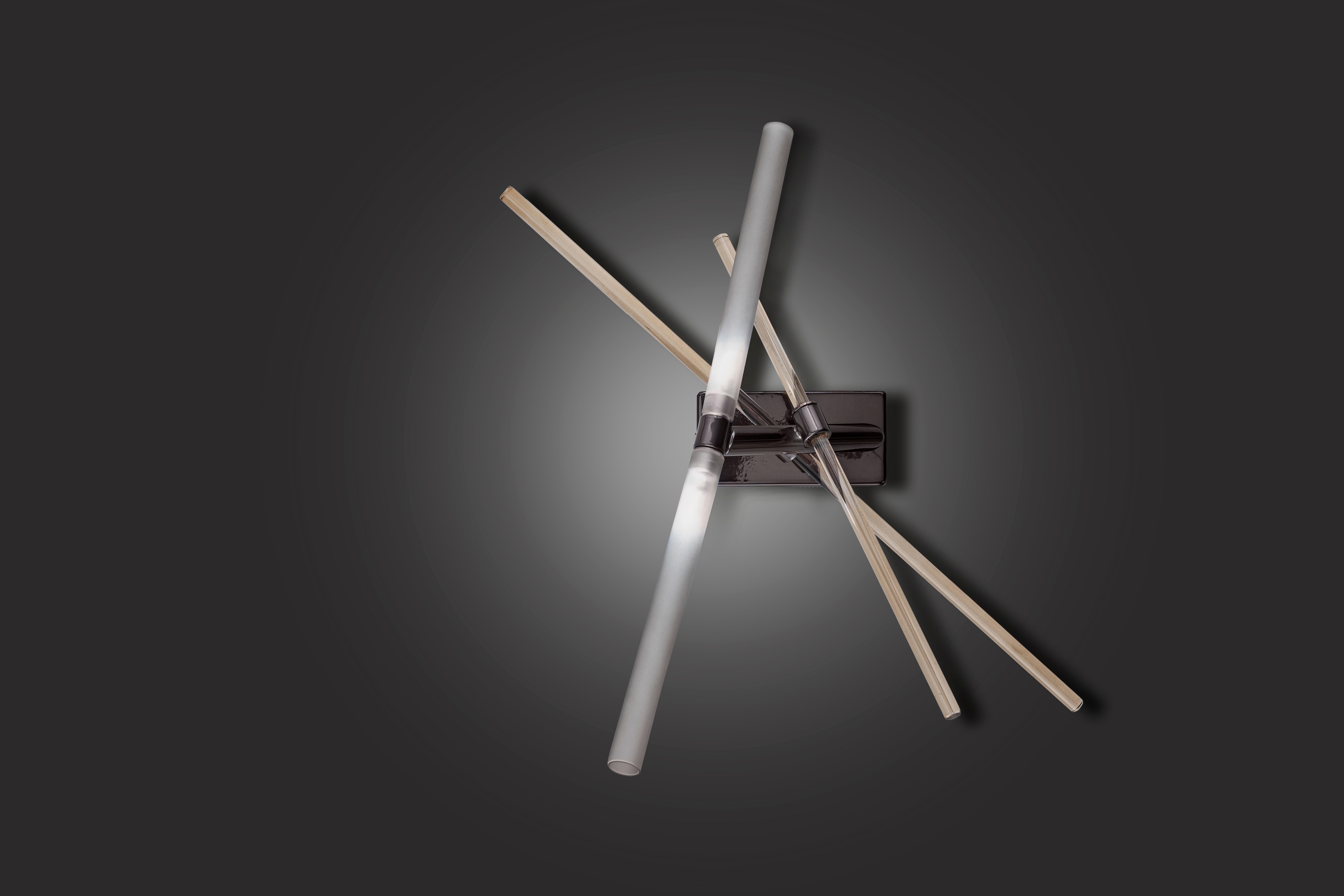 Effect A2 Wall Lamp by Euroluce Lampadari
Dimensions: D 66 x W 140 x H 70 cm.
Materials: Metal and glass.

Available in different colors. Prices may vary. All our lamps can be wired according to each country. If sold to the USA it will be wired for