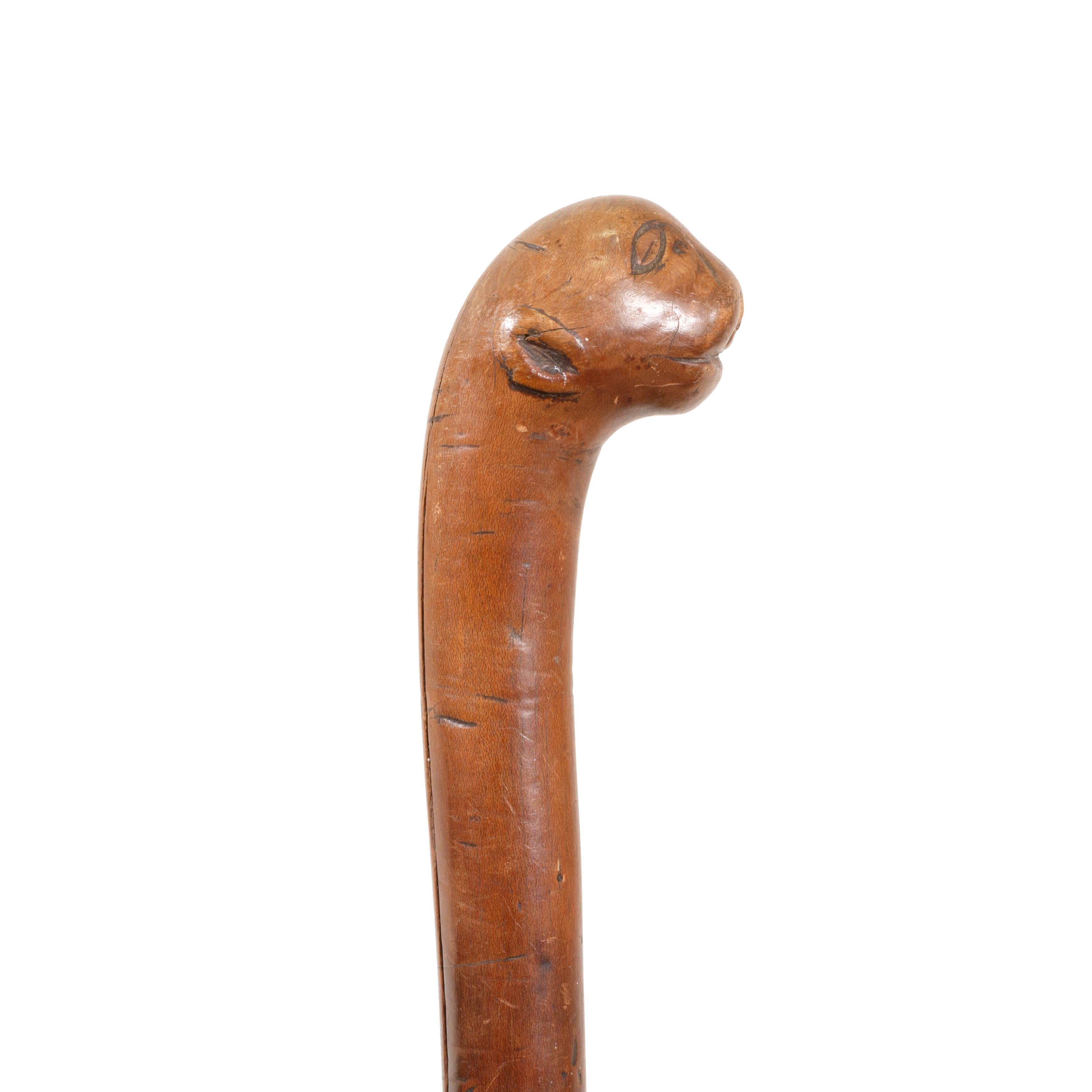 Northeast carved effigy cane with otter head. Patina plus. Ex John Behnken. 

Period: Mid-19th century or earlier

Origin: Northeast US

Size: 35