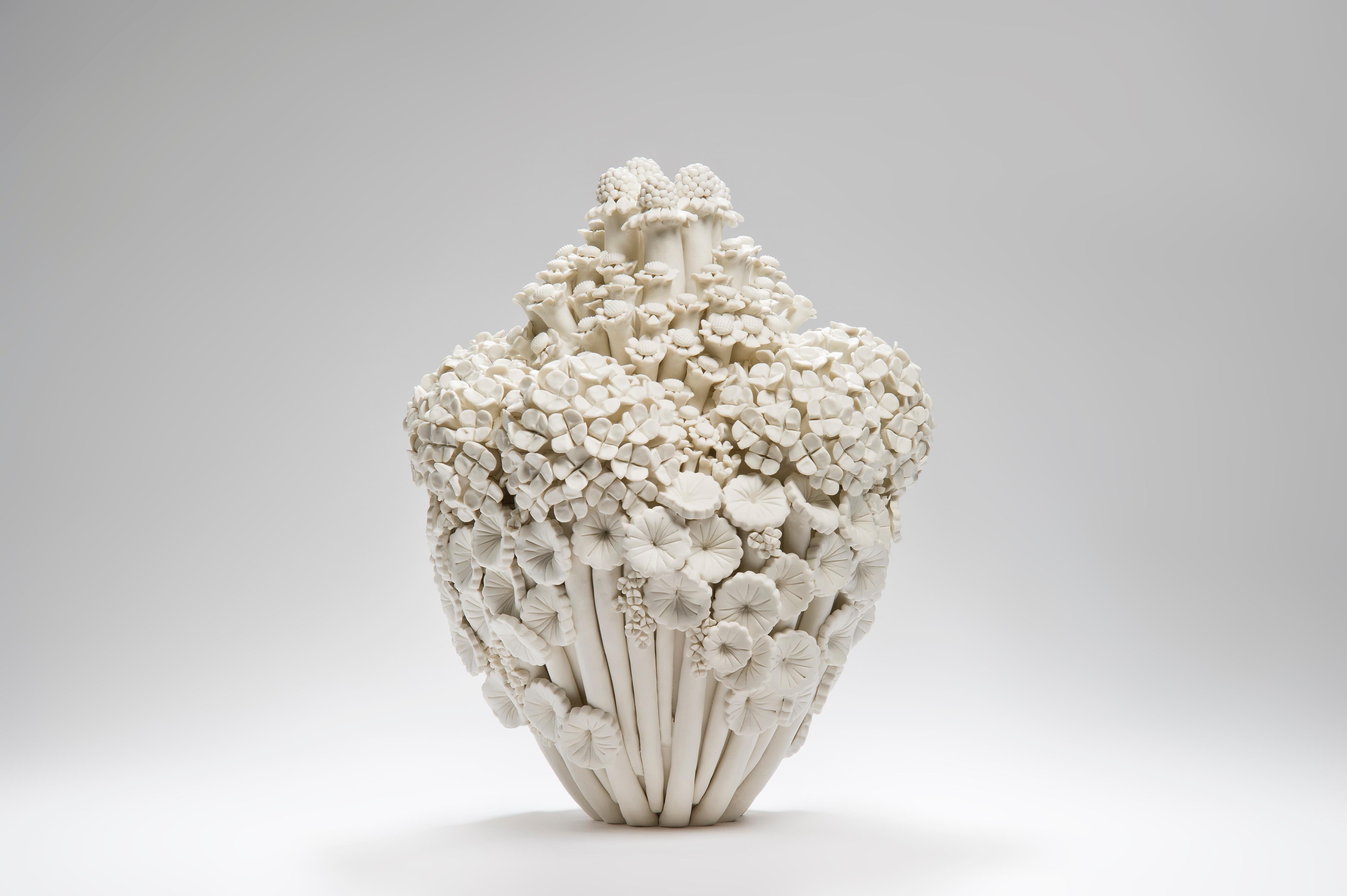 Efflorescence II, is a unique hand-sculpted porcelain sculpture completely covered in hundreds of individually made porcelain flowers of all different shapes and forms by the British artist Vanessa Hogge.

Vanessa Hogge breathes life into her clay