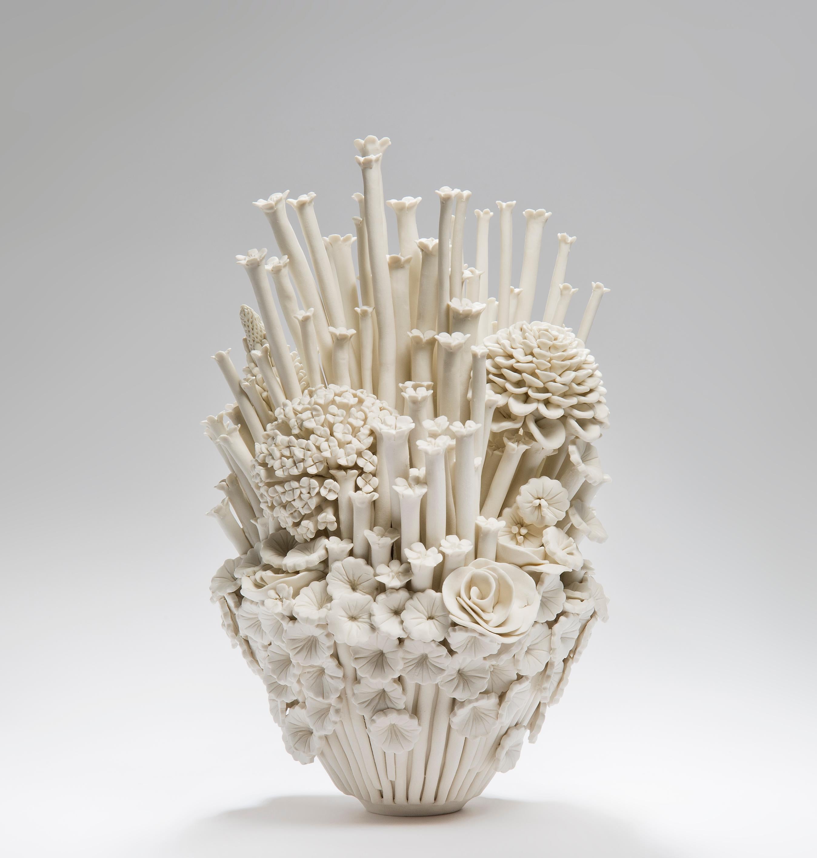 Efflorescence III, is a unique hand-sculpted porcelain sculpture completely covered in hundreds of individually made porcelain flowers of all different shapes and forms by the British artist Vanessa Hogge.

Vanessa Hogge breathes life into her