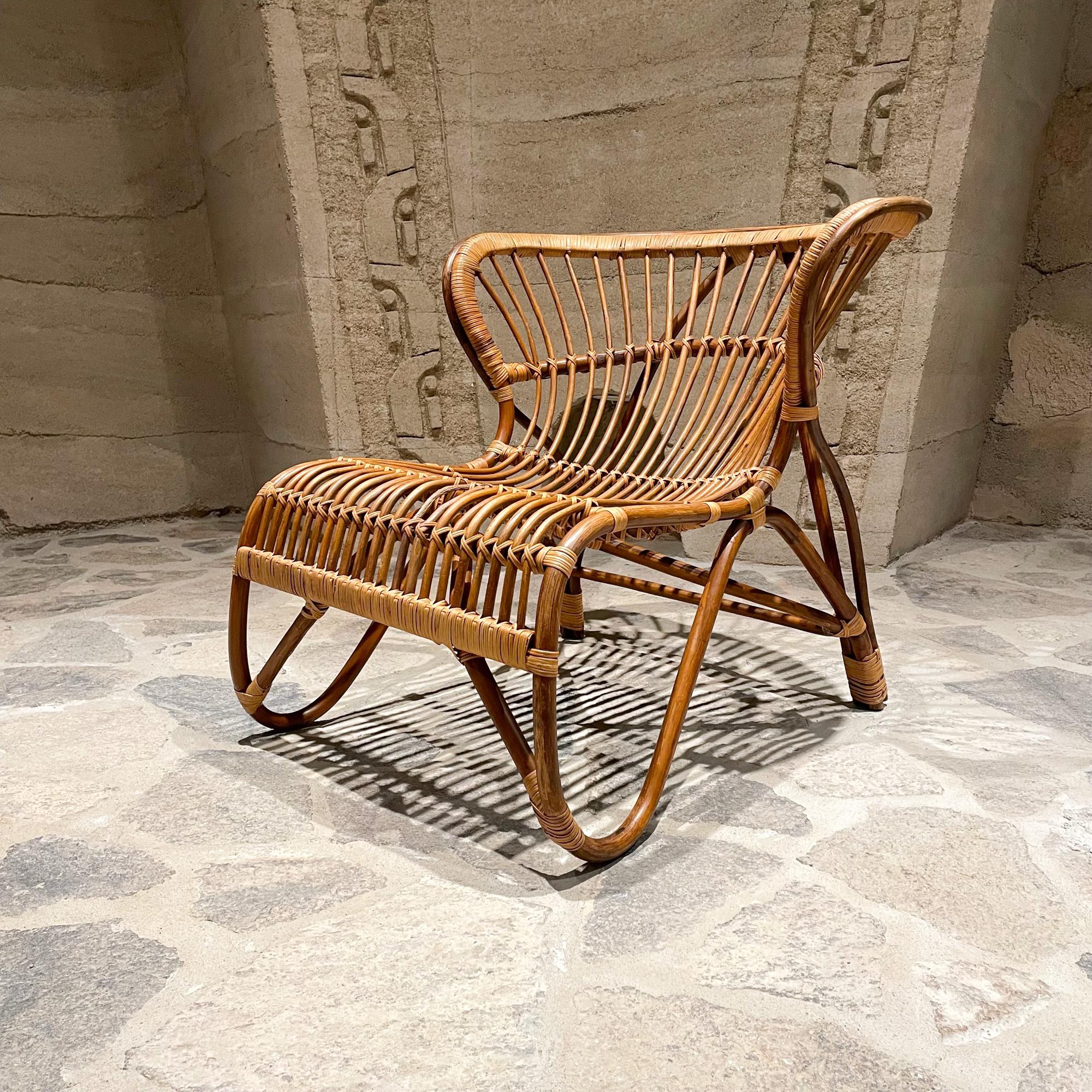 Rattan Lounge Chair
Effortlessly Cool Funkis Fox Lounge Chair in Rattan designed in 1936 by Viggo Boesen 
Award winning Sculptural modernism in natural rattan handmade and sustainable.
Smooth and solid with elegant curves
26.5 h x 28 w x 30 d