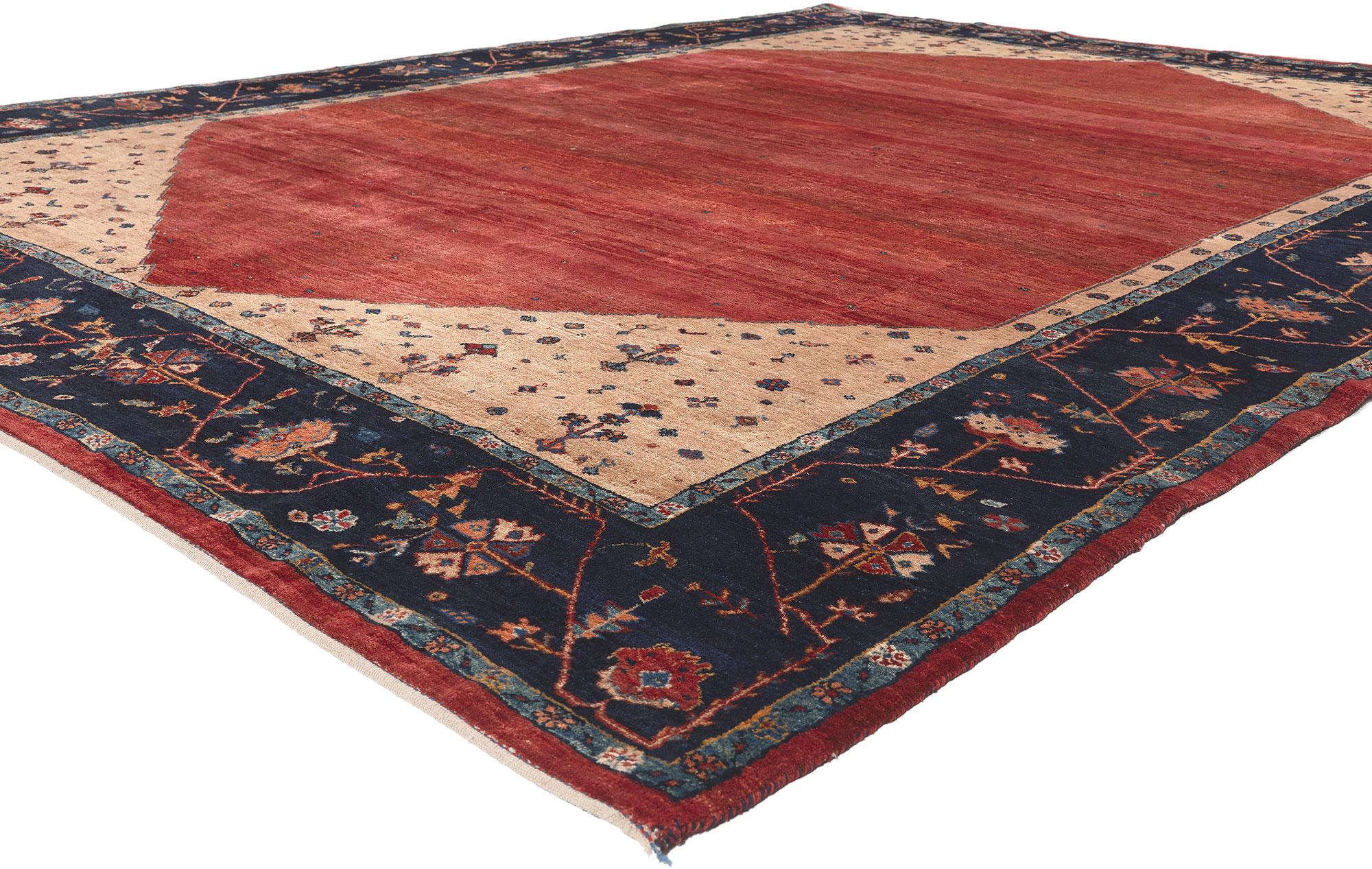 78567 Vintage Persian Gabbeh Rug, 08'06 x 11'03.
Emanating folk art warmth and traditional sensibility, this hand knotted wool vintage Persian Gabbeh rug is a captivating vision of woven beauty. The methodical design and refined colorway woven into