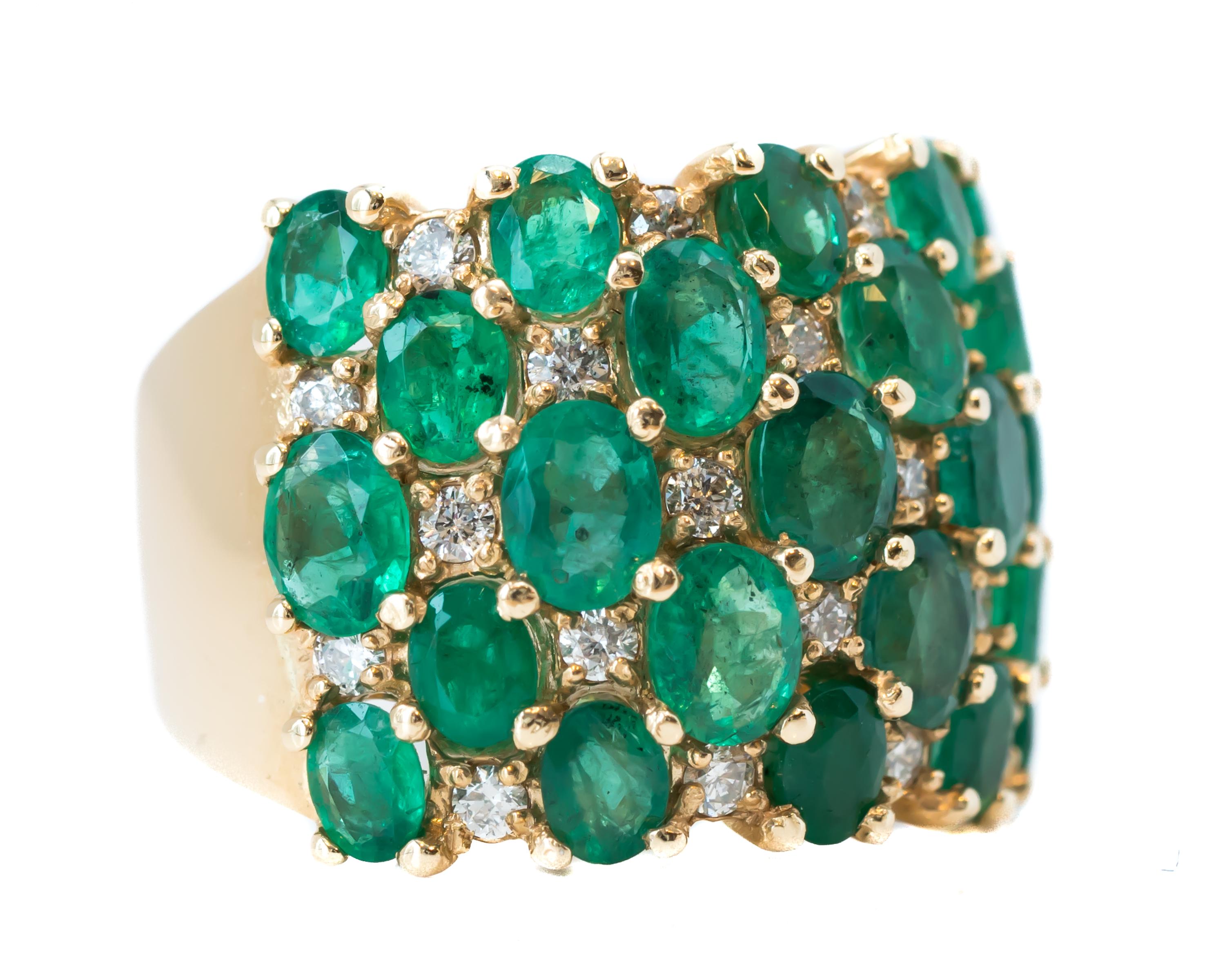 Features:
10.0 carats of Green Emeralds, Oval Cut
0.50 carat of Round Brilliant Diamonds
All diamonds and emeralds are prong set 
Crafted in 14 karat Yellow Gold

Band width tapers from 17.5 - 4.5 millimeters
Finger to top of stone measures 4