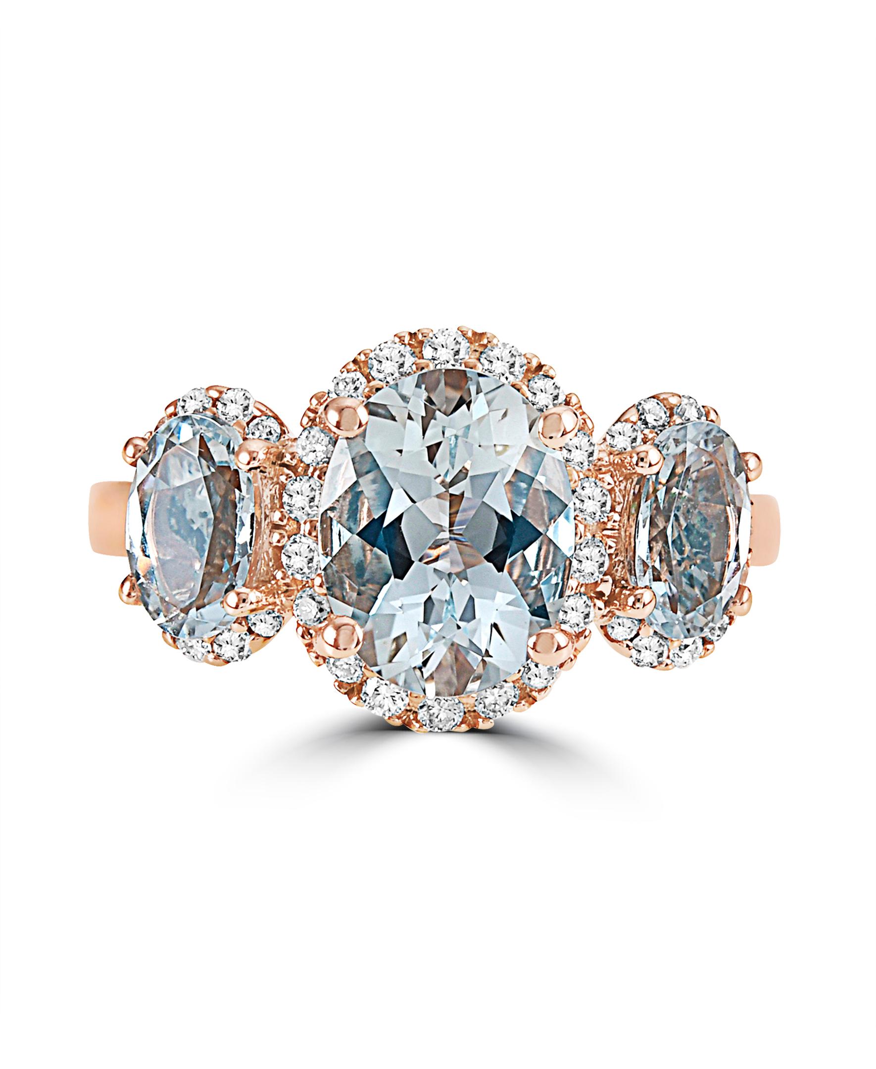 This Effy design ring is set in 14K rose gold. 
The three aquamarine stones are oval in shape and the weight is 2.65 ct.
The diamonds are round in shape and the total weight is 0.25 ct.
This ring is a sizable 7. 
The item number is R401.