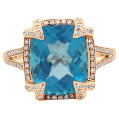 Effy 14 Karat Rose Gold Blue Topaz and Diamond Ring