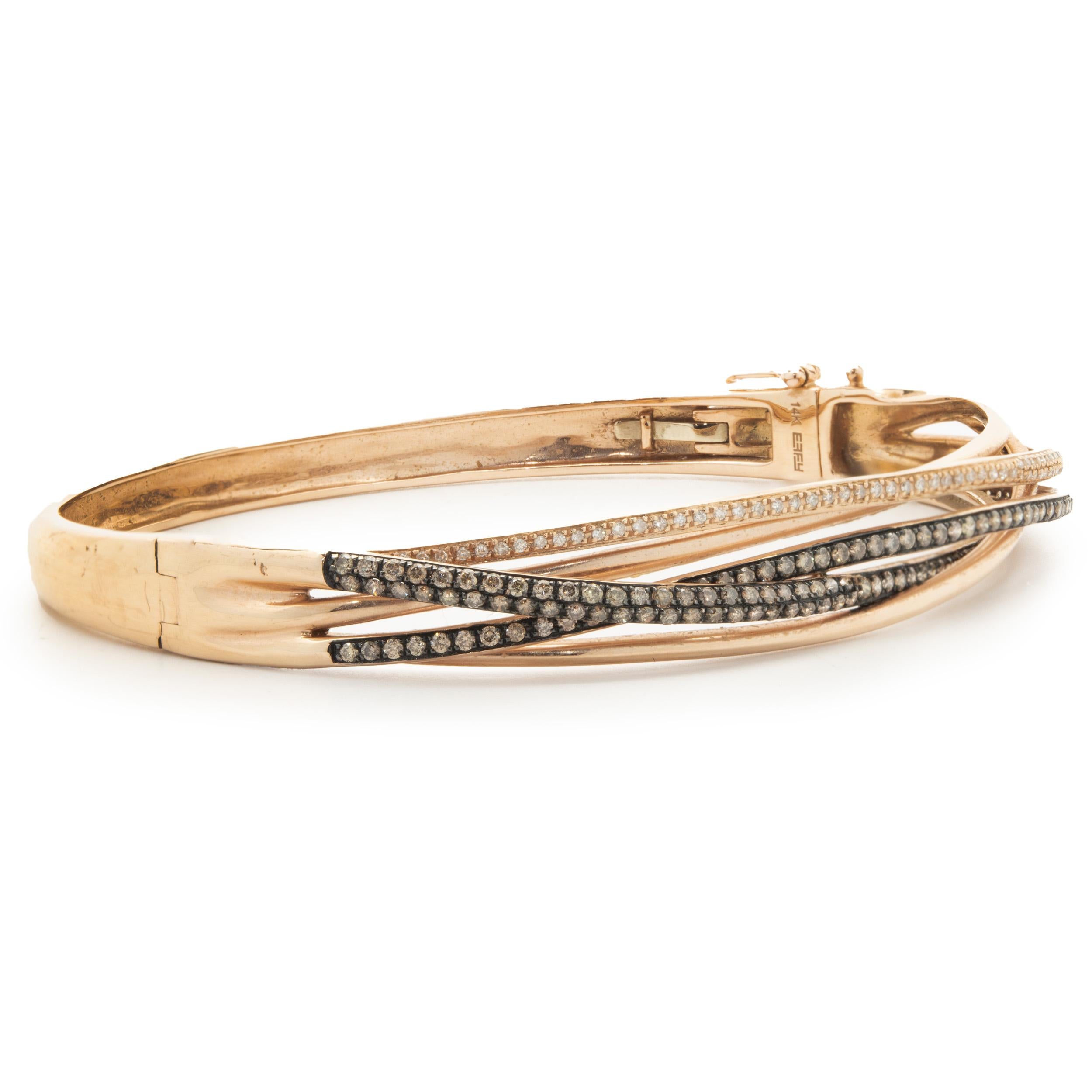 Designer: Effy
Material: 14K rose gold
Diamond: round brilliant cut = 1.26cttw
Color: G / Chocolate
Clarity: SI1
Measurement: bracelet measures 7-inches in length
Weight: 14.50 grams