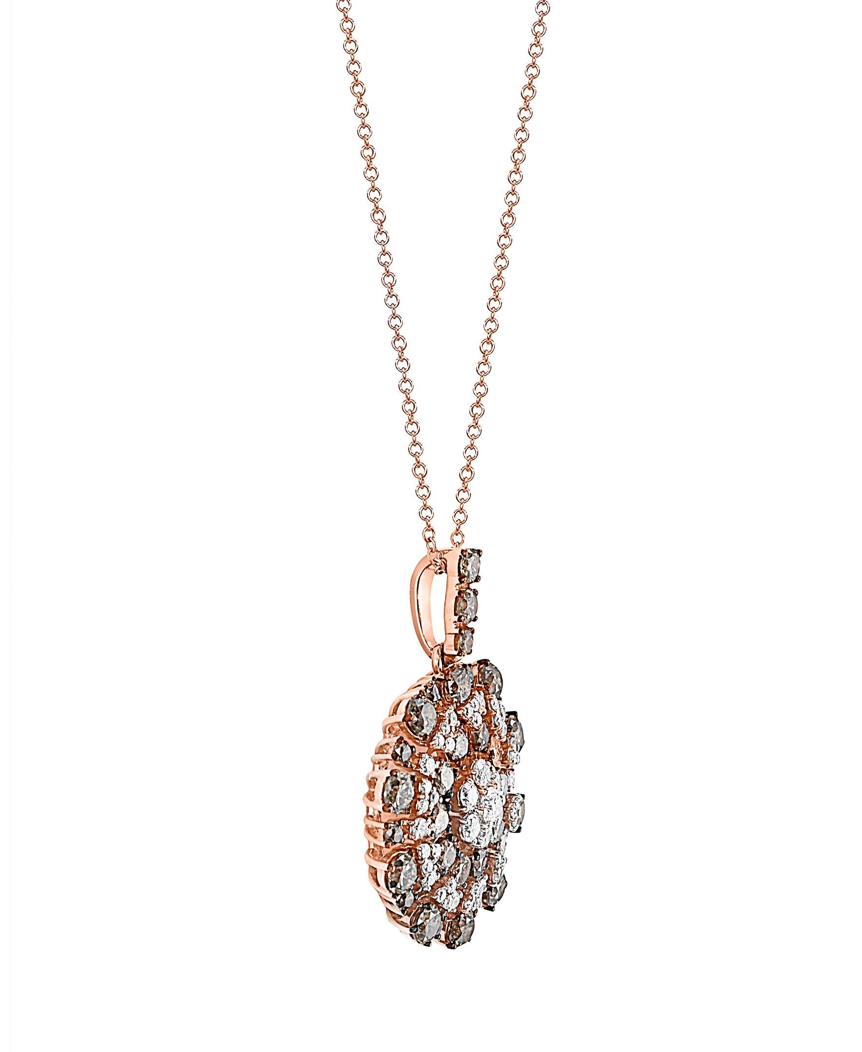 This Effy design pendant is set in 14K Rose gold. 
The design has a starburst of white and brown round diamonds, with a total weight of 1.81 ct.

The pendant has an 18