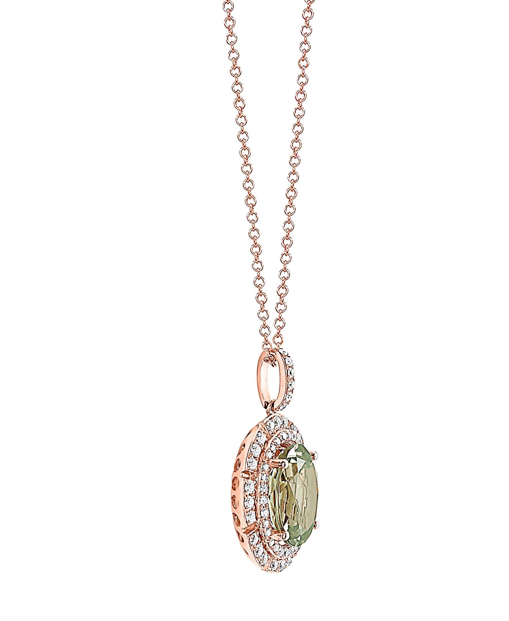 This Effy design pendant is set in 14K Rose gold. The center stone is an Oval Caeserite, with a total weight is 4.00 ct.
The design is accented by round shape white diamonds, with a total weight of 0.38 ct.
The pendant has an 18