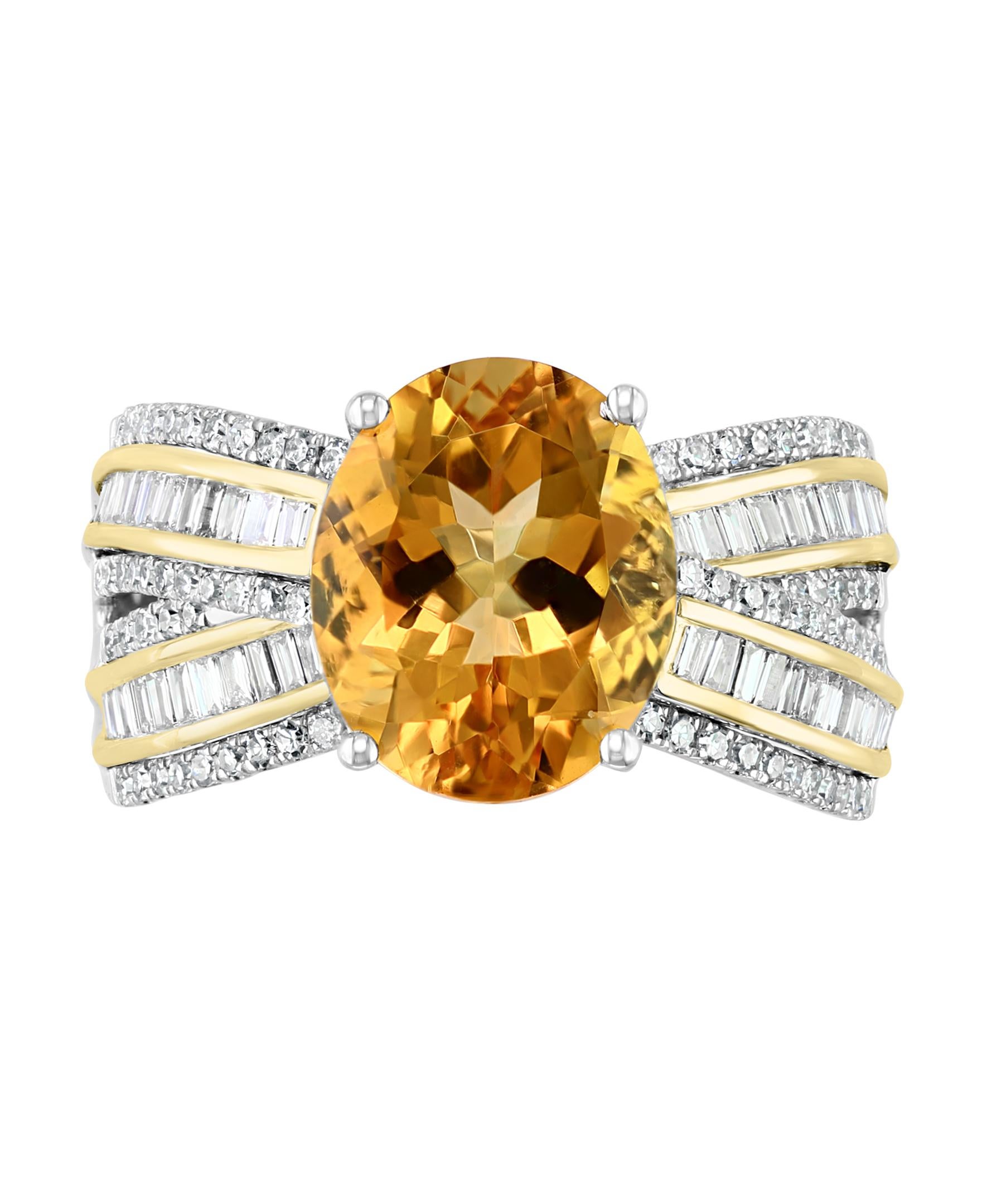 This Effy design ring is set in 14K white and yellow gold. 
The center stone is an oval shape Citrine and the weight is 3.20 ct.
The diamonds are baguette and round in shape and the total weight is 0.58 ct.
This ring is a sizable 7. 
The item number