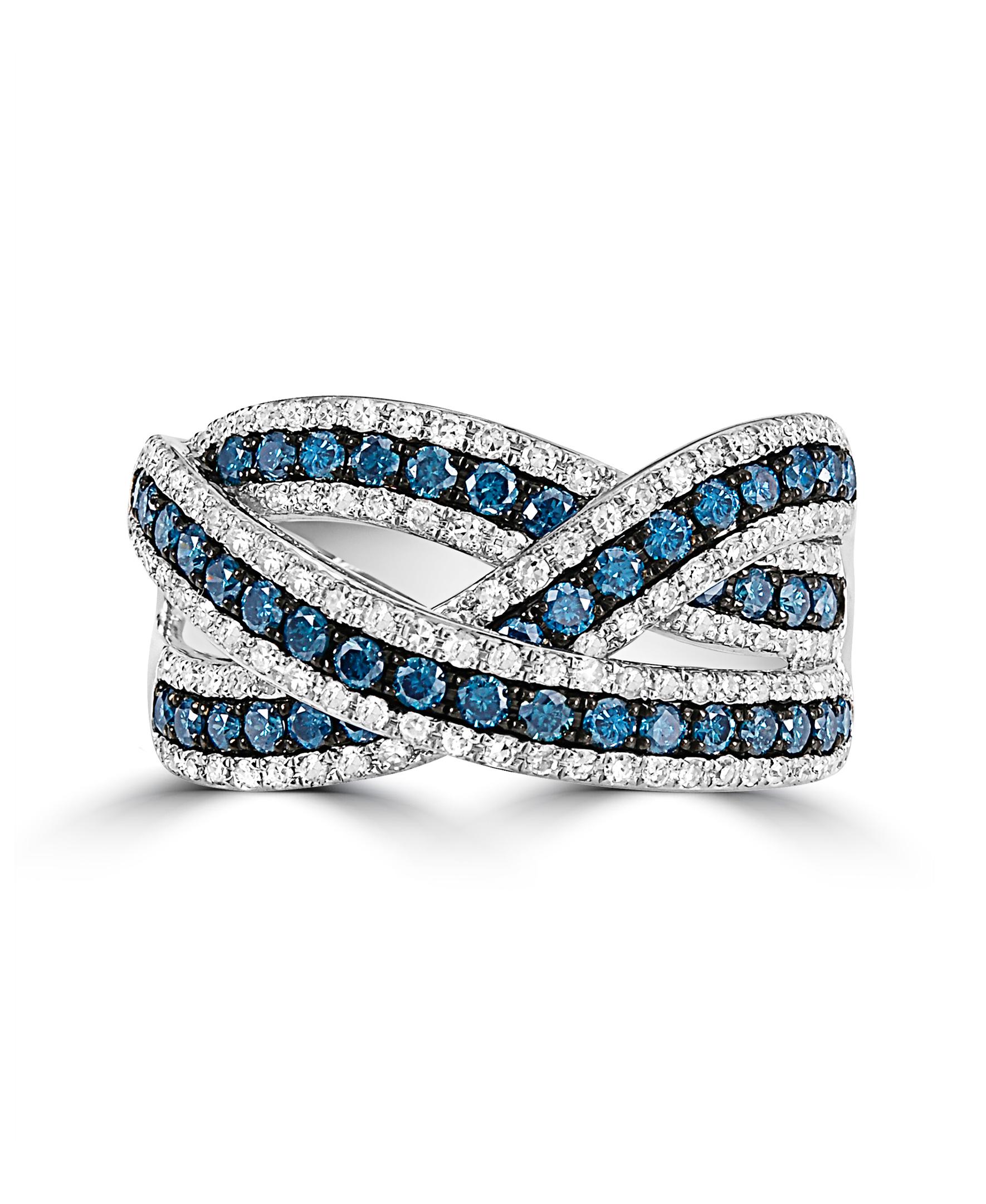 This Effy design ring is set in 14K white gold. 
The diamonds are round in shape, with a combination of white and blue colors,  and the total weight is 1.06 ct.
This ring is a sizable 7. 
The item number is R537.