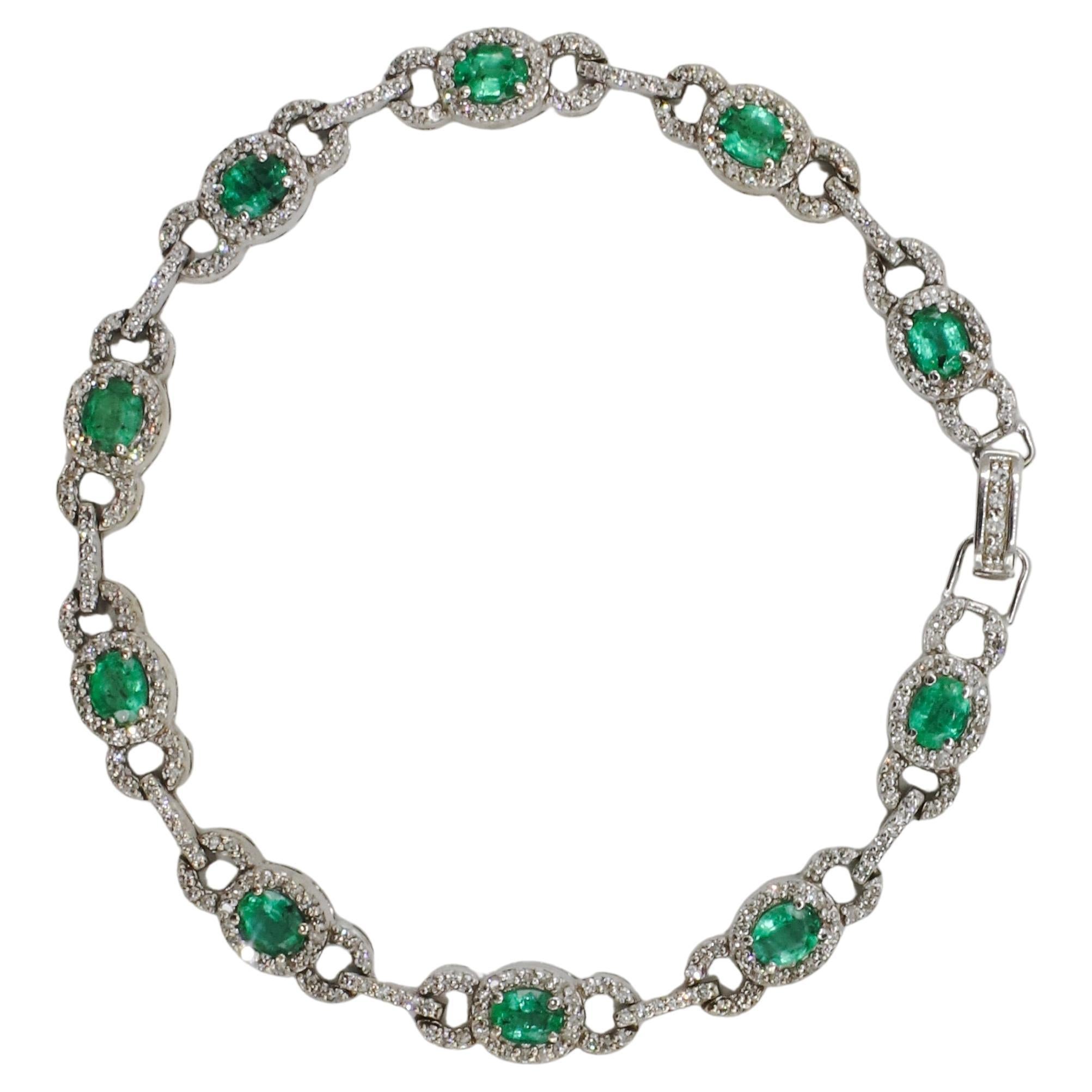 Bracciale linea tennis Effy in oro bianco 14 carati con diamanti naturali e smeraldi verdi in vendita