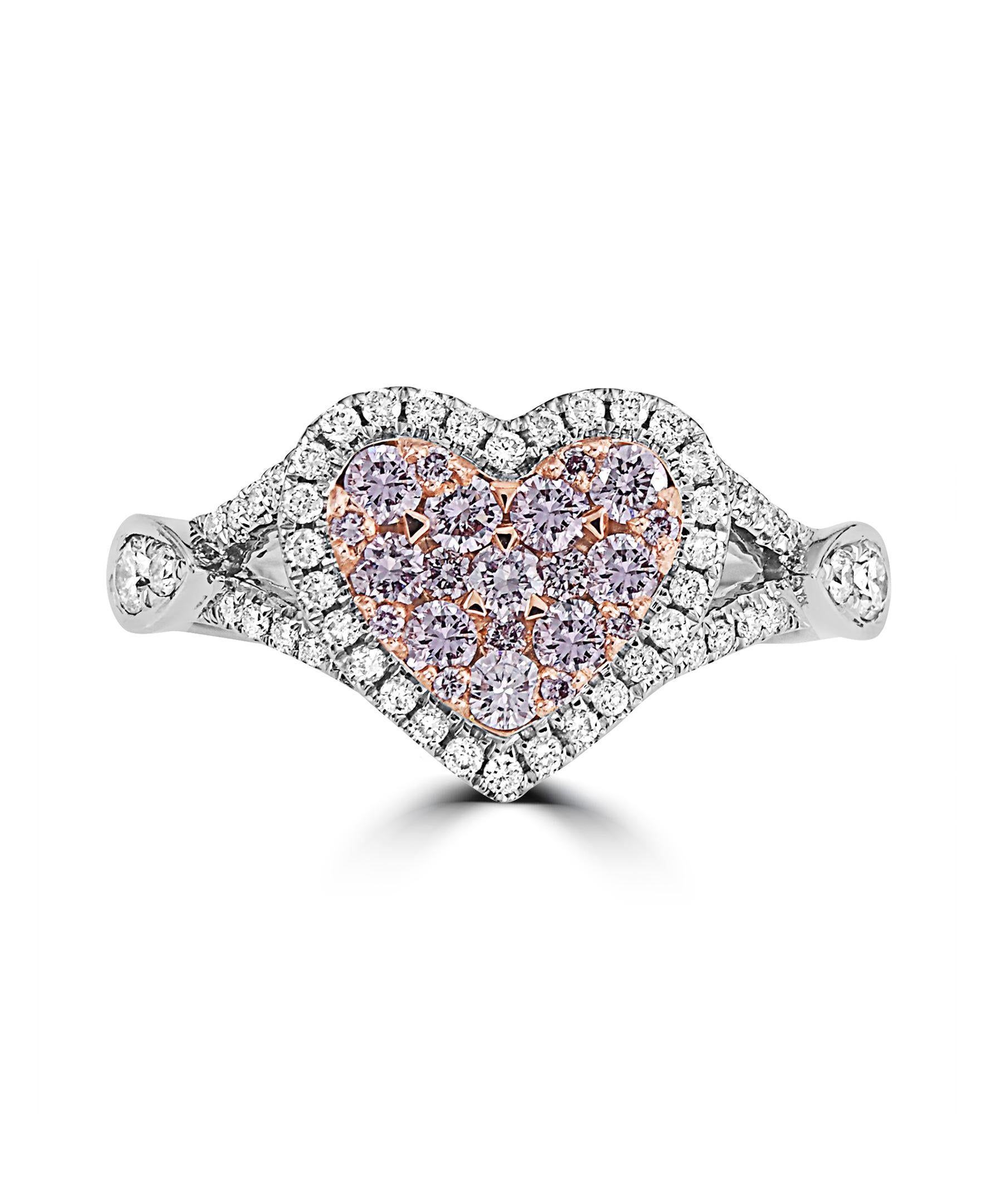 This Effy design ring is set in 14K White gold. 
The diamonds are a combination of white and pink diamonds in round shape and with a total weight is 0.68ct.
This ring is a sizable 7. 
The item number is DP27.