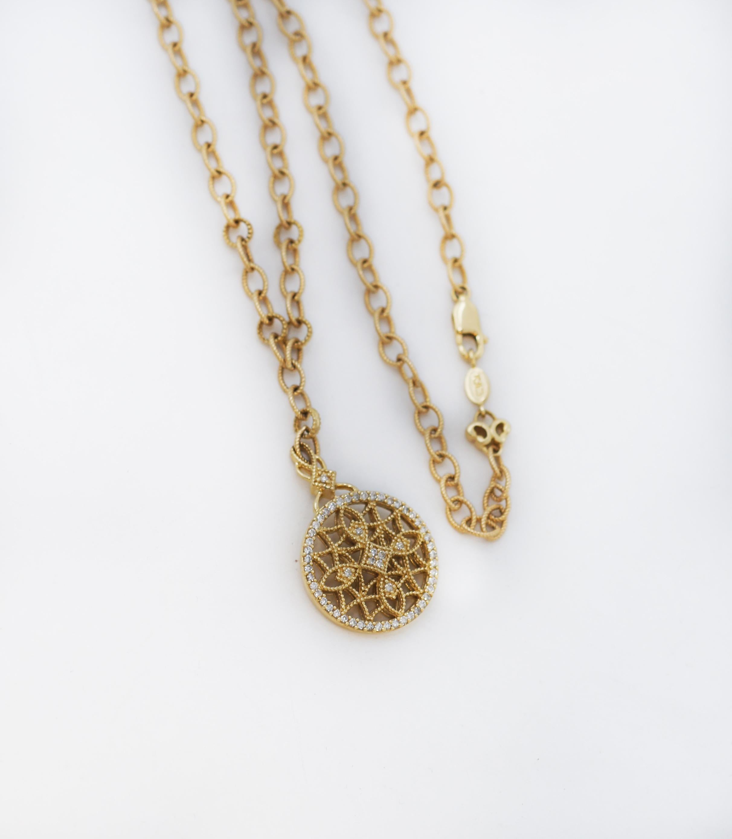 EFFY 14k gold Diamond Filigree Vintage Style Medallion Necklace
As lovely as the intricate scrollwork of antique-inspired designs, this pendant necklace from EFFY features diamonds in the Flower-shaped details.
Style: Diamond Pendant