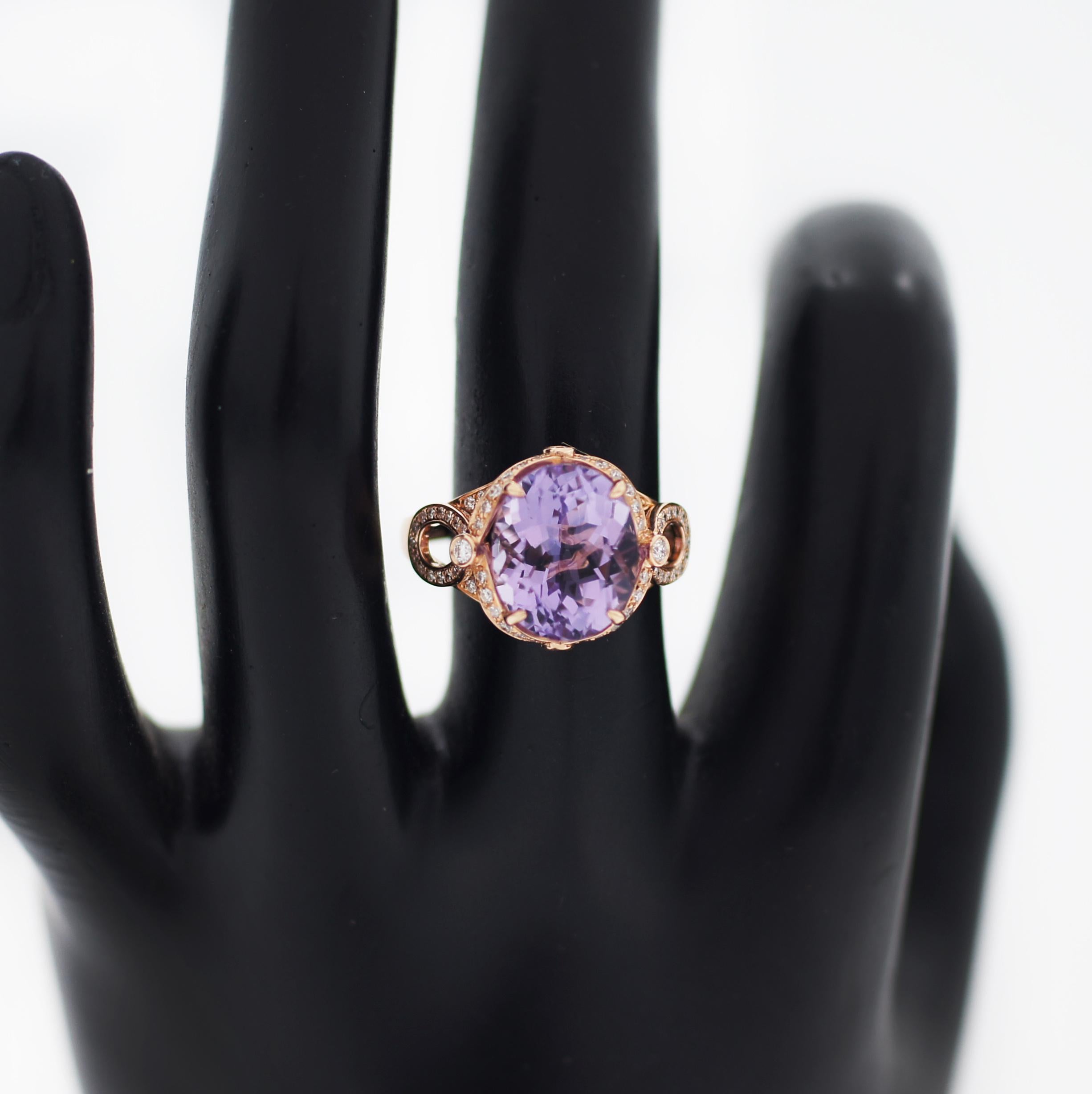 This impressive women's ring from the Effy collection features a breathtaking natural amethyst gemstone framed by shimmering round diamonds. Additional round diamonds line a split-shank loop, while bezel-set diamonds grace the shoulders and profiles