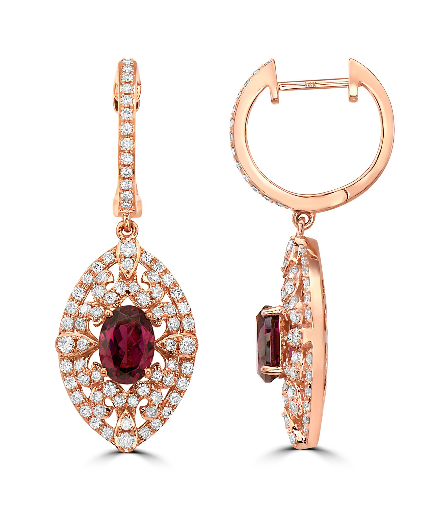 This Effy creation is a timeless design, featuring diamonds and the rich hues of Rhodolite Garnet. These long dangling earrings have a classic Rococo style.

Total weight of diamonds are 0.97ct Total weight of Rhodolite Garnet is 2.30ct.

Item