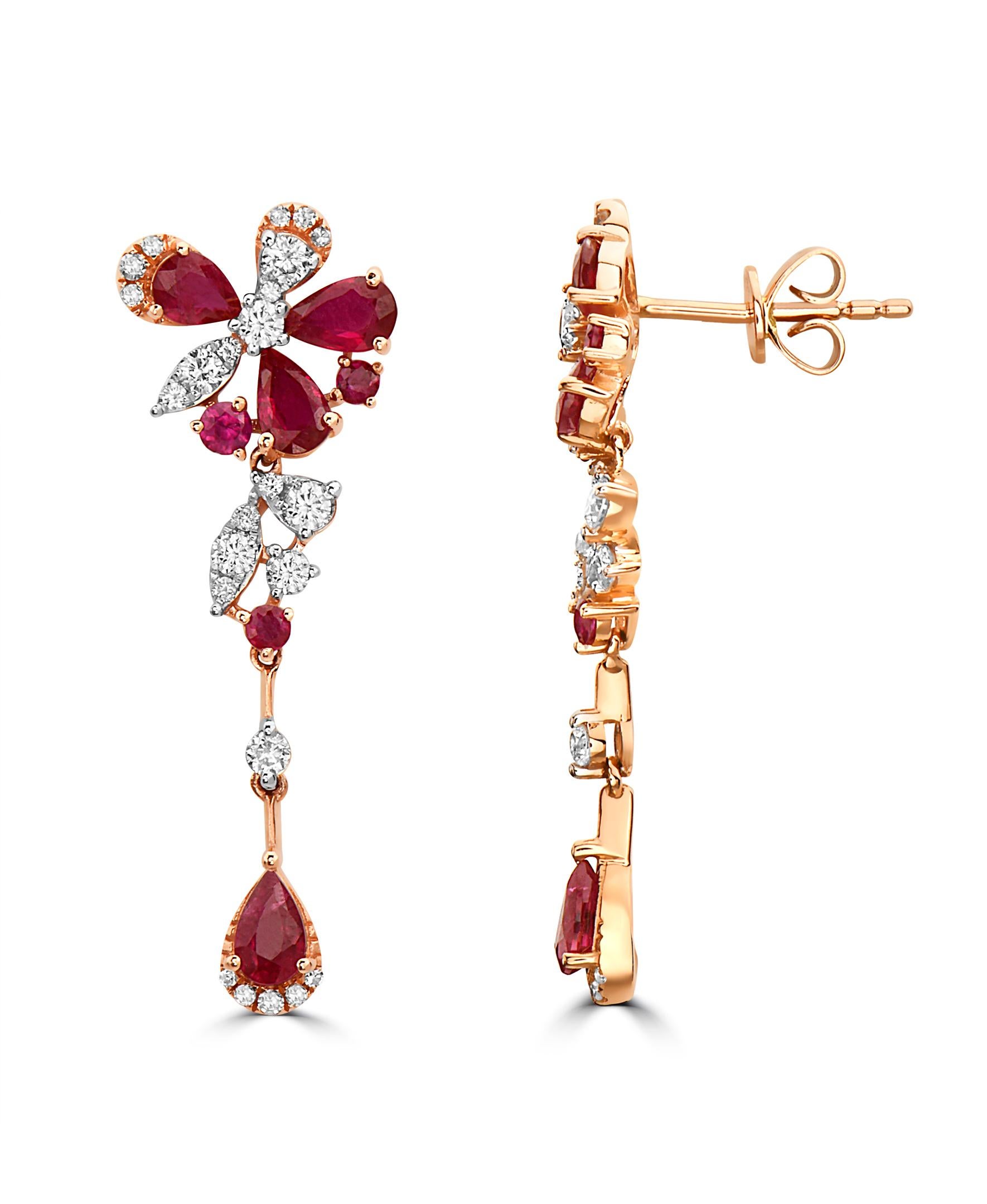 Playful dangling earrings, set in 14K rose gold, with round cut diamonds weighing 0.51ct and a combination of pear shape and round rubies, weighing a total of 2.04cts.

Item number  EE42.