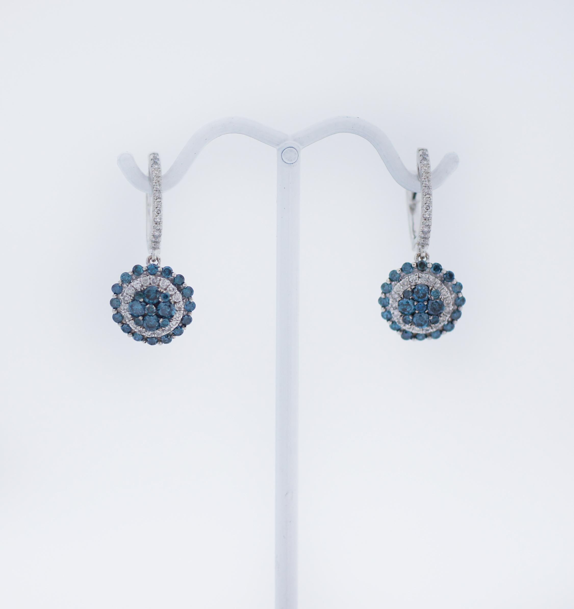 EFFY™ Collection
Elevate your evening attire when you wear these blue and white multi-diamond double frame drop earrings from the EFFY™ Collection.
Fashioned in 14K white gold
Each drop showcases a round composite of multi-sized alluring blue