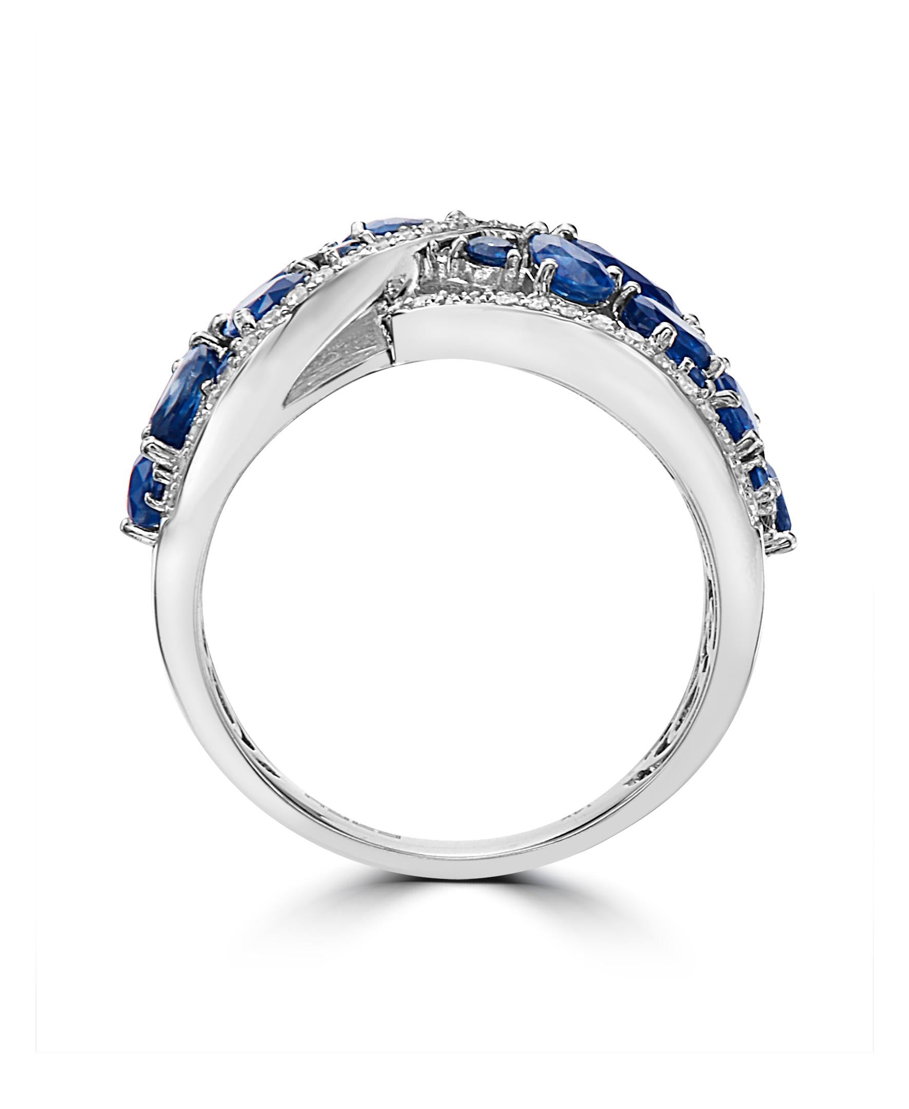 This Effy design ring is a feast for the eyes, with blue sapphires in four different shapes - oval, round, pear and marquise - forming a mosaic together. Surrounded by a twist of round diamonds to finish the perfect style.

Total diamond weight is