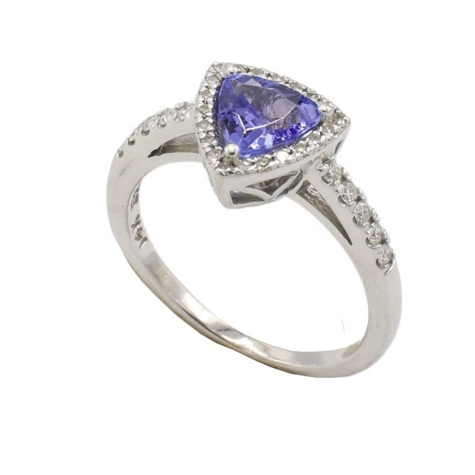 Effy 14K White Gold Trillion Tanzanite and Natural Diamond Halo Cocktail Ring
Metal: 14k white gold
Weight: 3.1 grams
Gemstone: Trillion tanzanite 0.76 carat
Diamonds: .20 CTW natural round diamonds G-H VS
Size: 6.25 (US)
Top: 9.5 x 9.5mm
Retail: