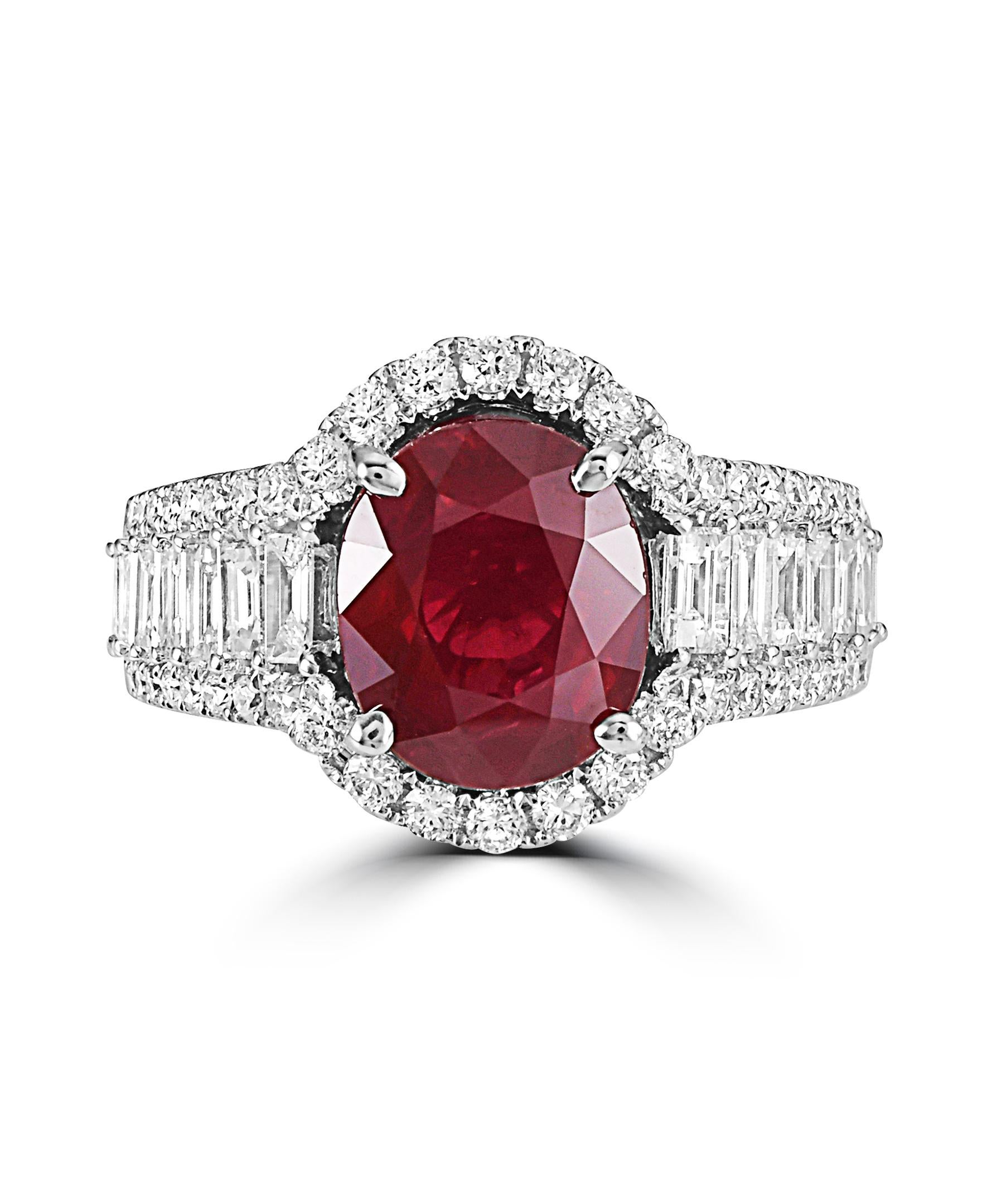 This Effy Hematian Collection design ring is set in 18K White gold. The center stone is an Oval shape Ruby with a total weight of 4.01 ct.
The center stone is surrounded with round and baguette shape diamonds, with a total weight of 2.04 ct.
This