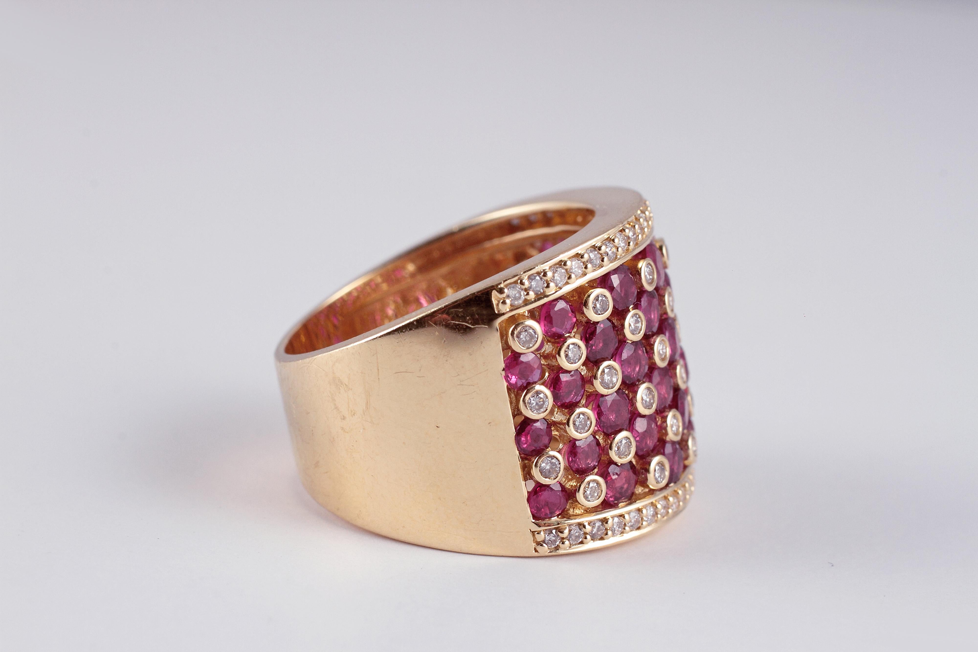 You won't believe how comfortable this ring is! In 14 karat yellow gold by Effy, with rubies and accent diamonds, this striking ring is a size 7 3/4 and measures 0.62