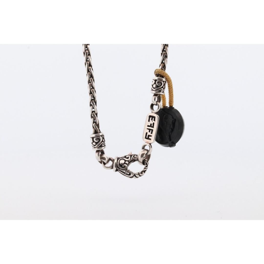 Vintage
Materials: Stone
Gemstone: Diamond

Pendant width: 12 Millimeters; Pendant height: 21 Millimeters; Necklace length: 18 Inches

Iconic EFFY BH Necklace. Made out of Sterling Silver and 18k Yellow Gold. Byzantine design. Pendant is set with