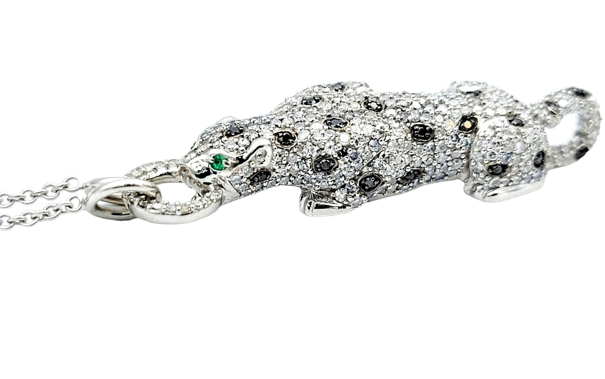 This pave diamond panther pendant necklace by Effy exudes an exquisite blend of elegance and fierceness. Crafted in polished 14 karat white gold, this remarkable jewelry piece showcases a stunning panther pendant, a symbol of strength and
