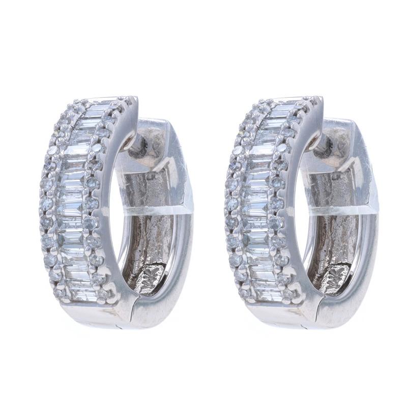 Brand: EFFY

Metal Content: 14k White Gold

Stone Information

Natural Diamonds
Carat(s): .50ctw
Cut: Single & Baguette
Color: G - H
Clarity: SI1 - I1

Total Carats: .50ctw

Style: Huggie Hoop
Fastening Type: Snap Closures

Measurements

Tall: 5/8