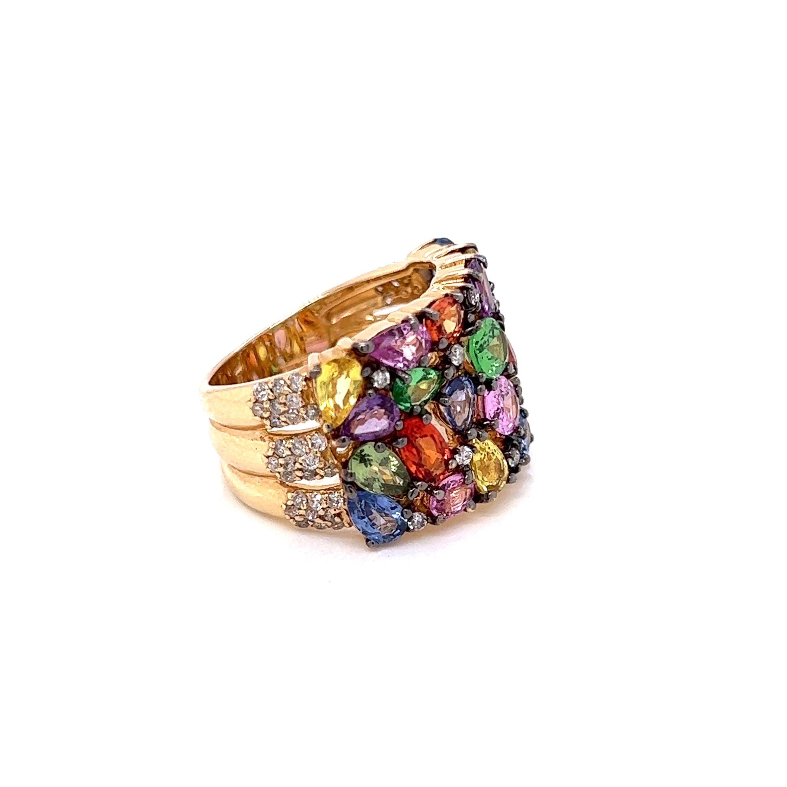 This fun ring looks better than a jar of candy! Fabulous multicolor Effy ring features a rainbow of colors in sapphire and tsavorite accented by .49 cttw white diamonds.  This bold statement ring would be a high fashion compliment a monochromatic