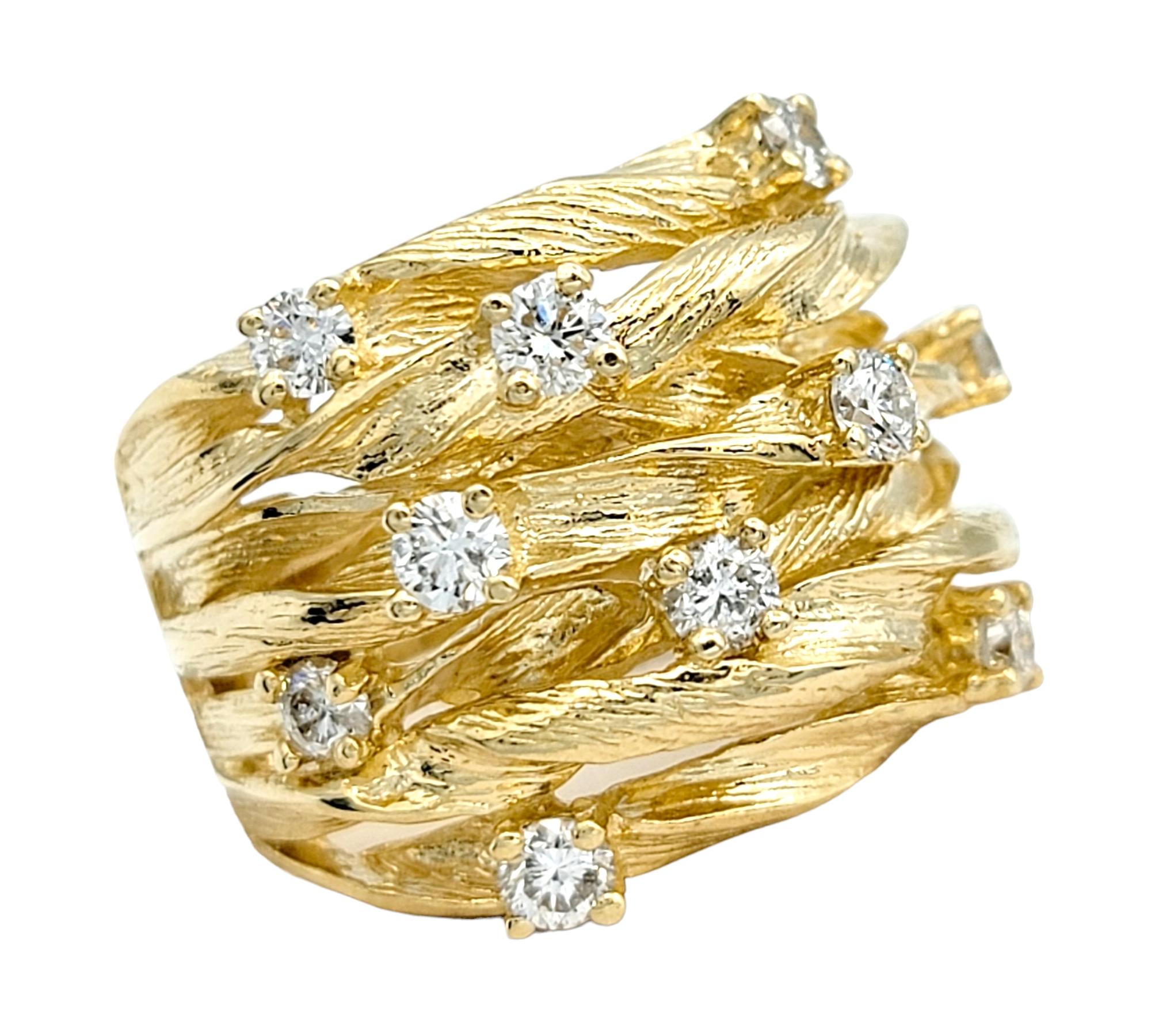 Ring Size: 7.25

This beautiful Effy D'Oro diamond band ring from the Effy Collection is a captivating and distinctive piece that seamlessly combines classic design elements with a modern twist. Crafted with precision and artistry, this wide band