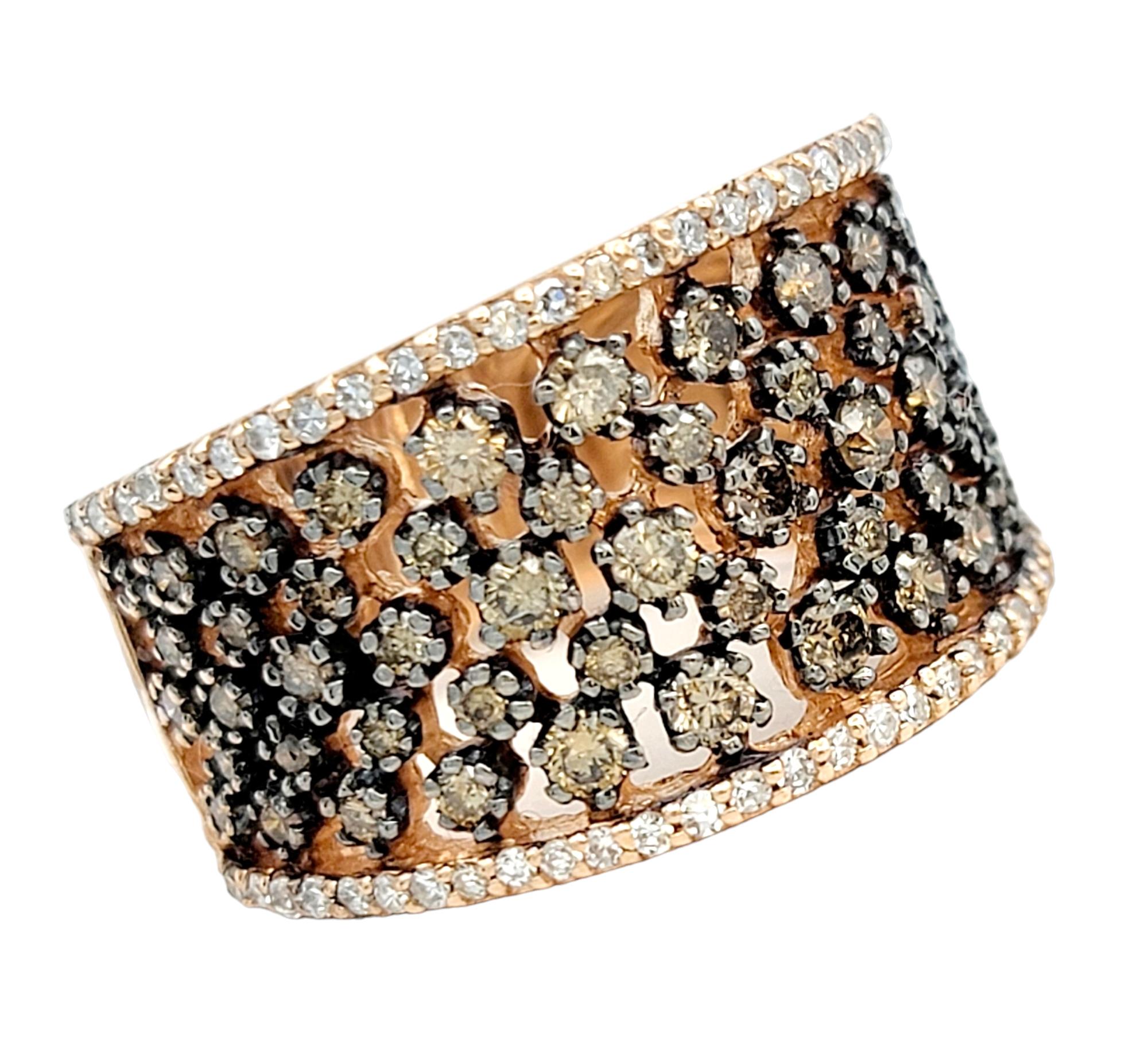 Ring Size: 7

Elevate your style with the captivating allure of this Effy espresso cognac and white diamond band ring, a masterpiece set in the warm embrace of 14-karat rose gold. The intricate design of the ring features a mesmerizing center