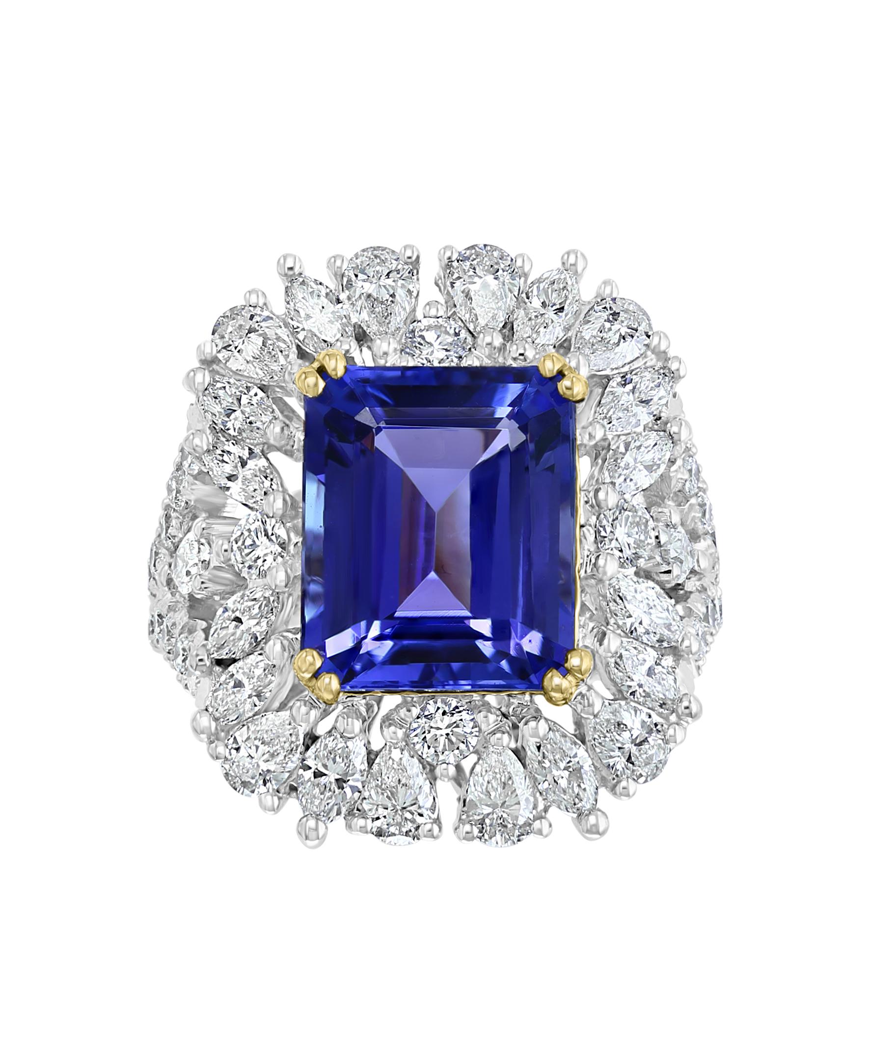 A truly magnificent design that combines so many shapes of stones that converge to hug the center stone Tanzanite.
This Effy Hematian design ring is set in 18K White gold, with 18K Yellow gold prongs holding the Tanzanite stone. The Tanzanite stone