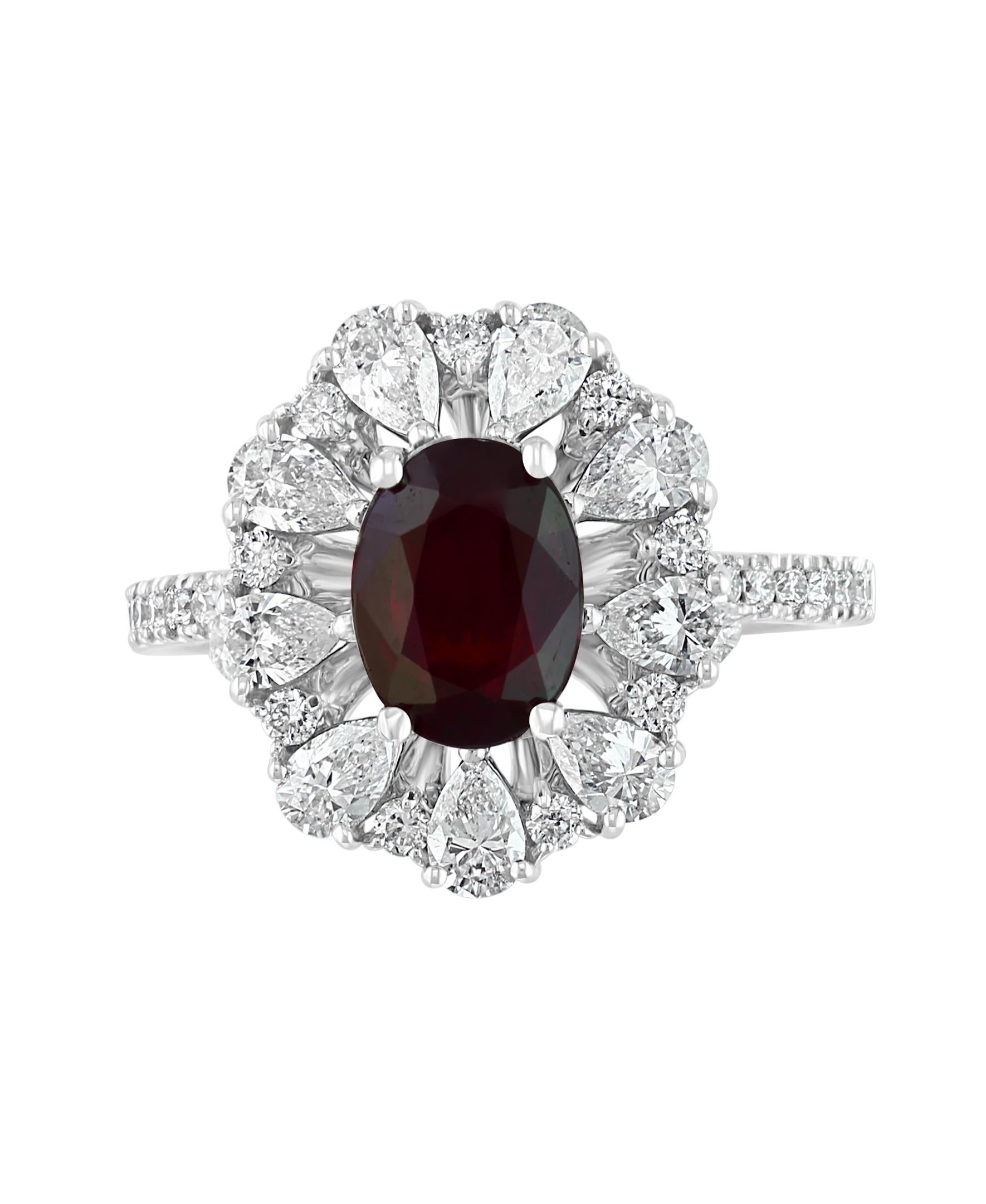 This Effy Hematian design ring is set in 18K White gold. The center stone Ruby is oval cut, and has a weight of 1.75 ct.
Surrounded by nine Pear shape Diamonds with a weight of 0.88 ct. and round cut diamonds with a weight of 0.29 ct. Together all